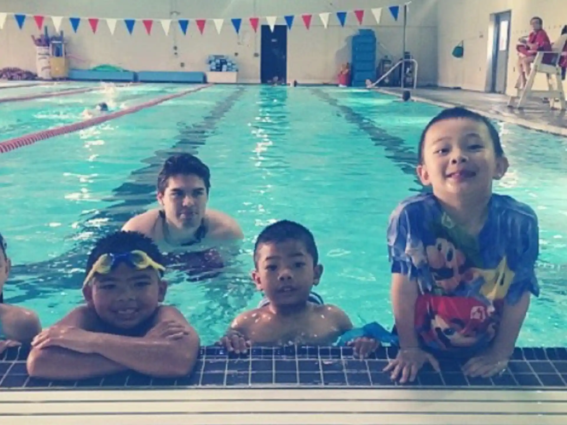 a group of people in a pool