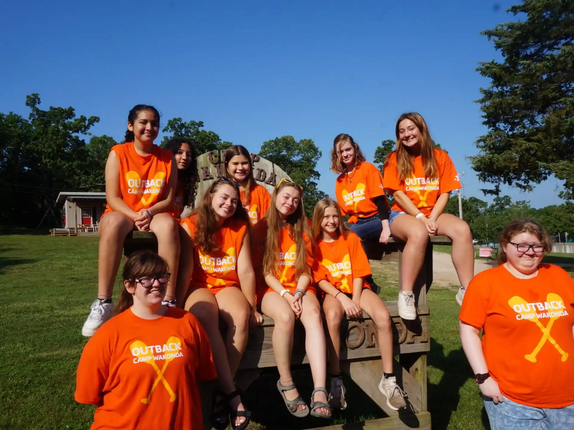 a group of people posing for a photo