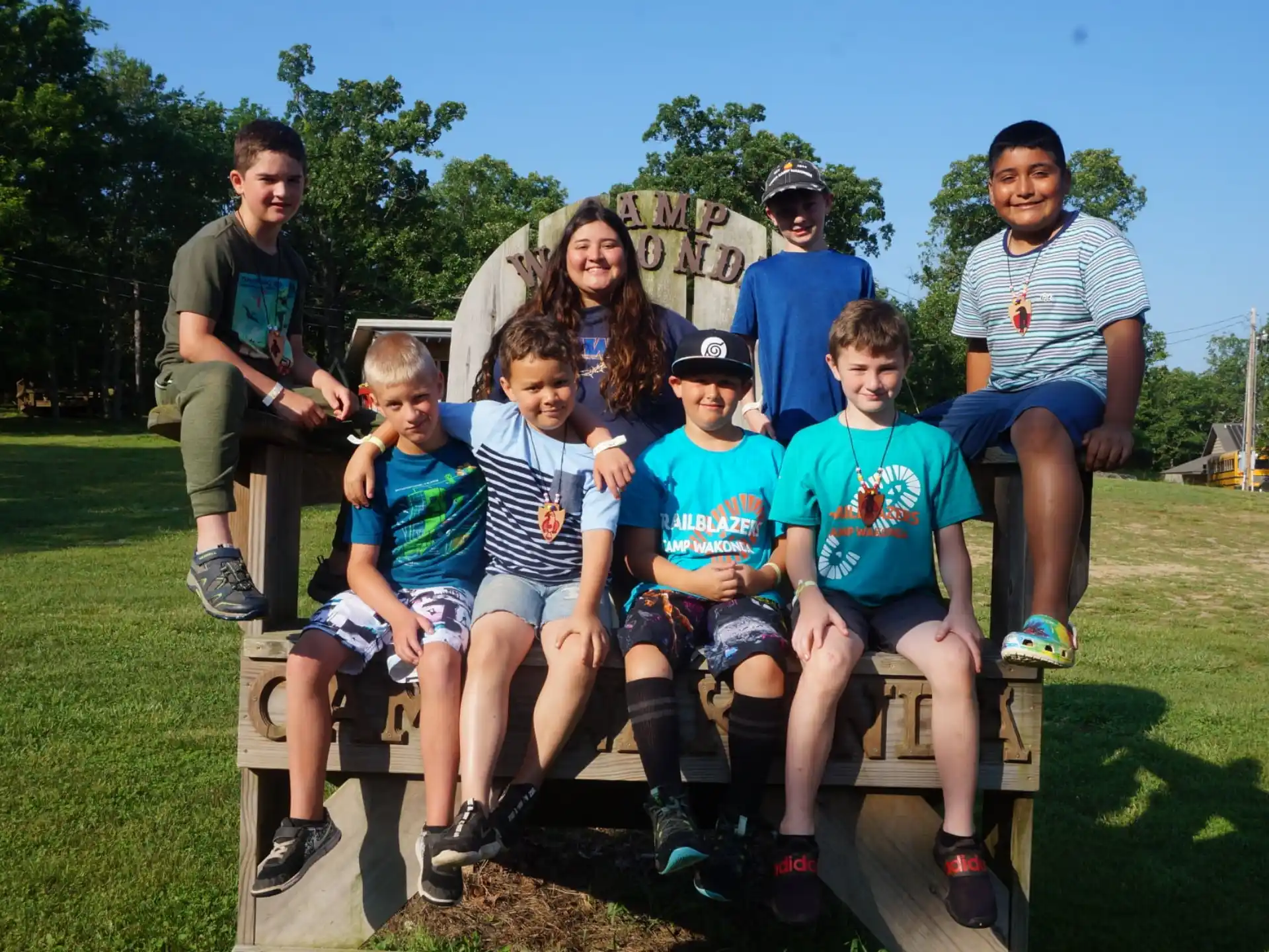 a group of people sitting on a bench