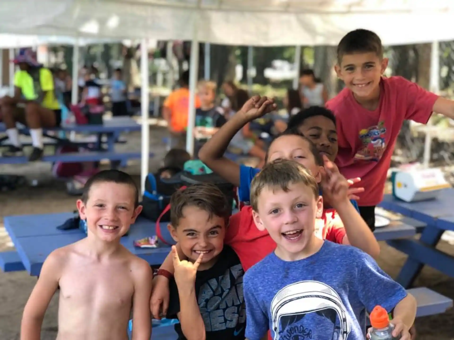 a group of boys posing for a photo