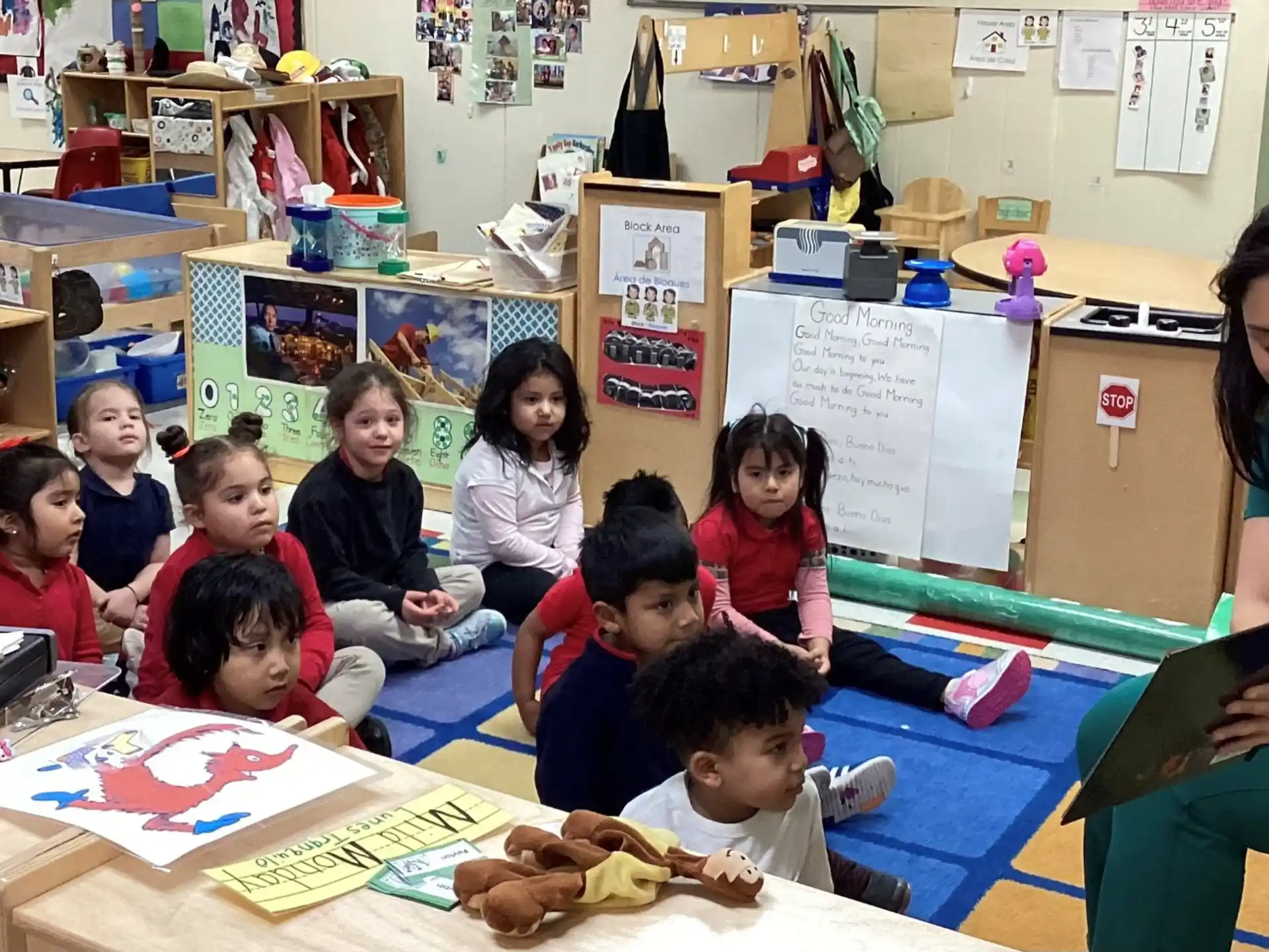 a person teaching children in a classroom