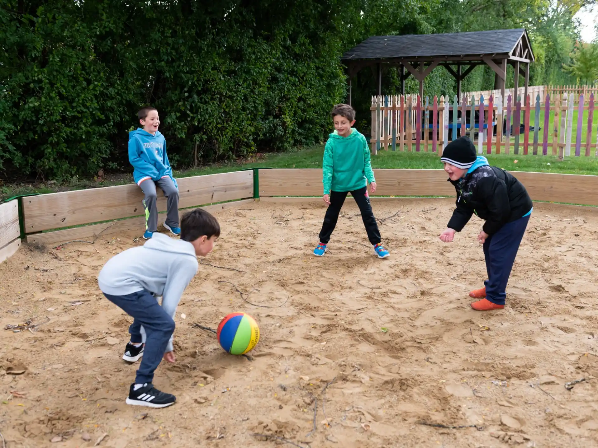 a group of boys playing football