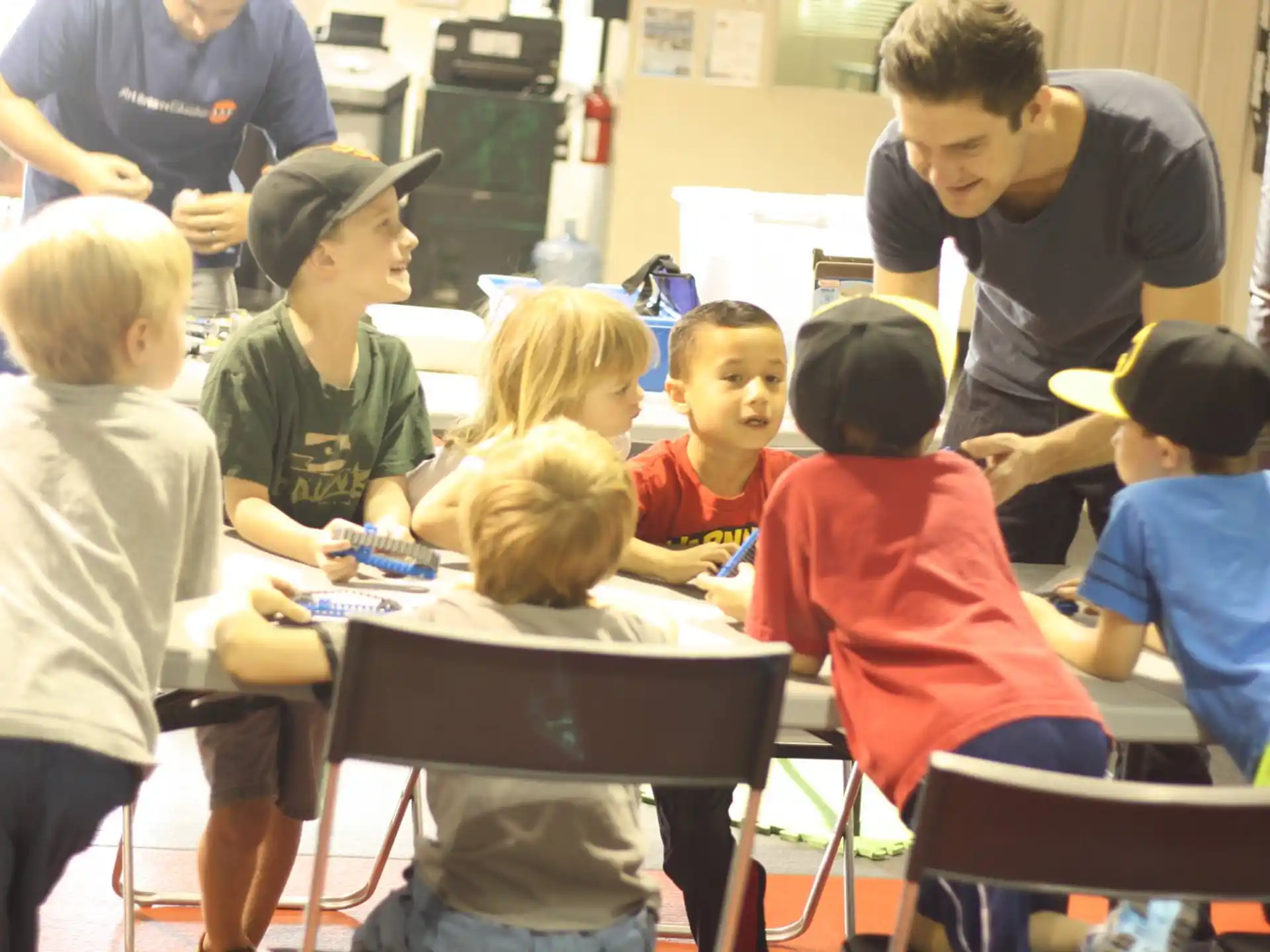 a group of children sitting at desks