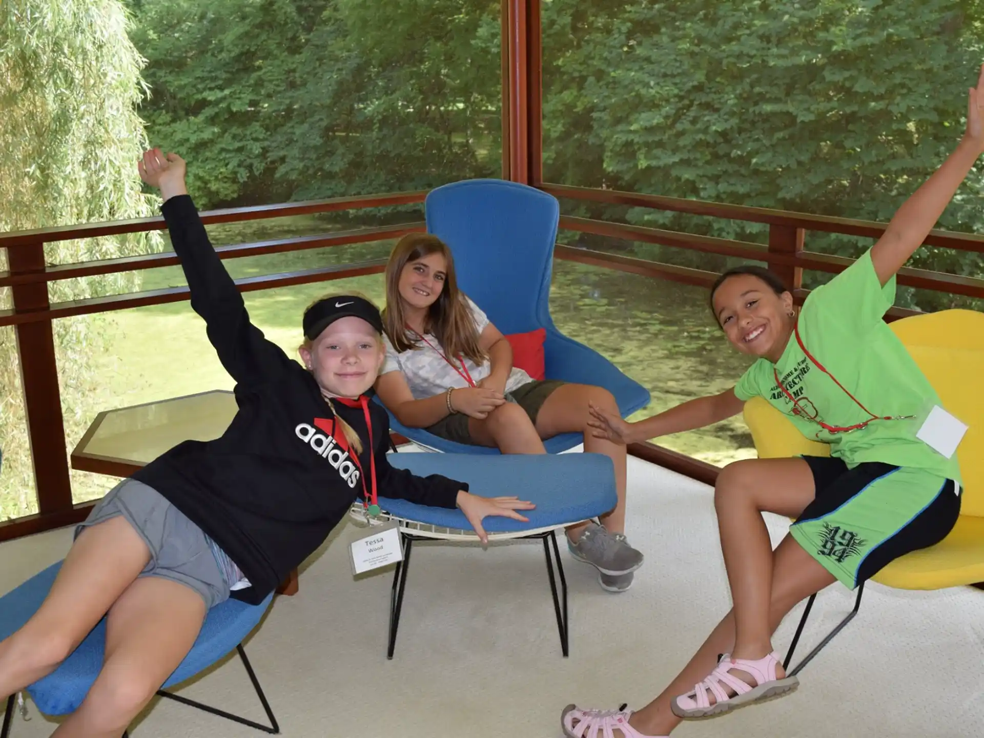 a group of people sitting in chairs