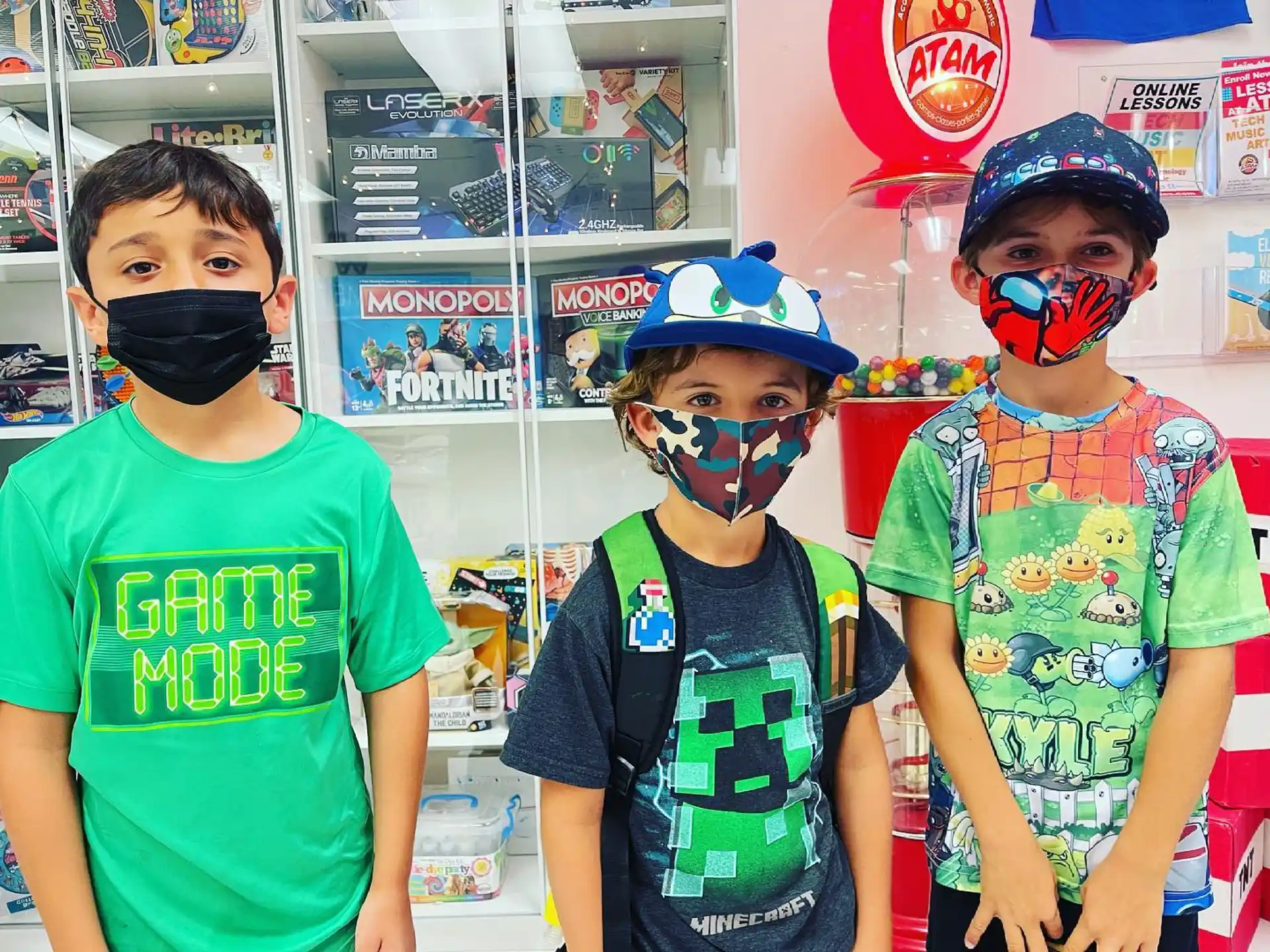 a group of boys wearing face masks