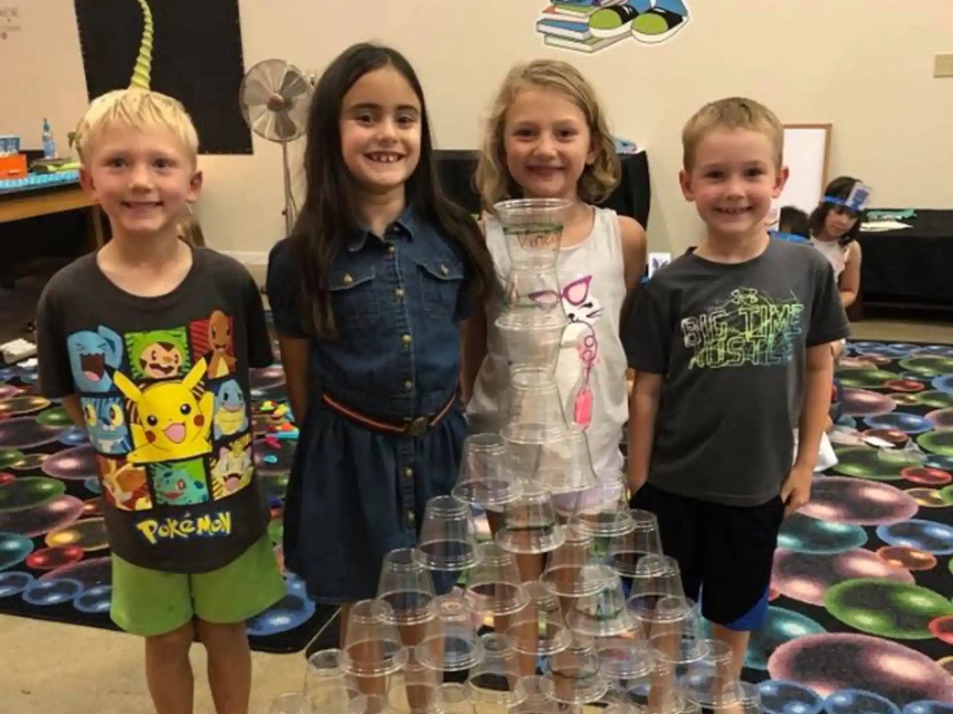 a group of children posing for a photo