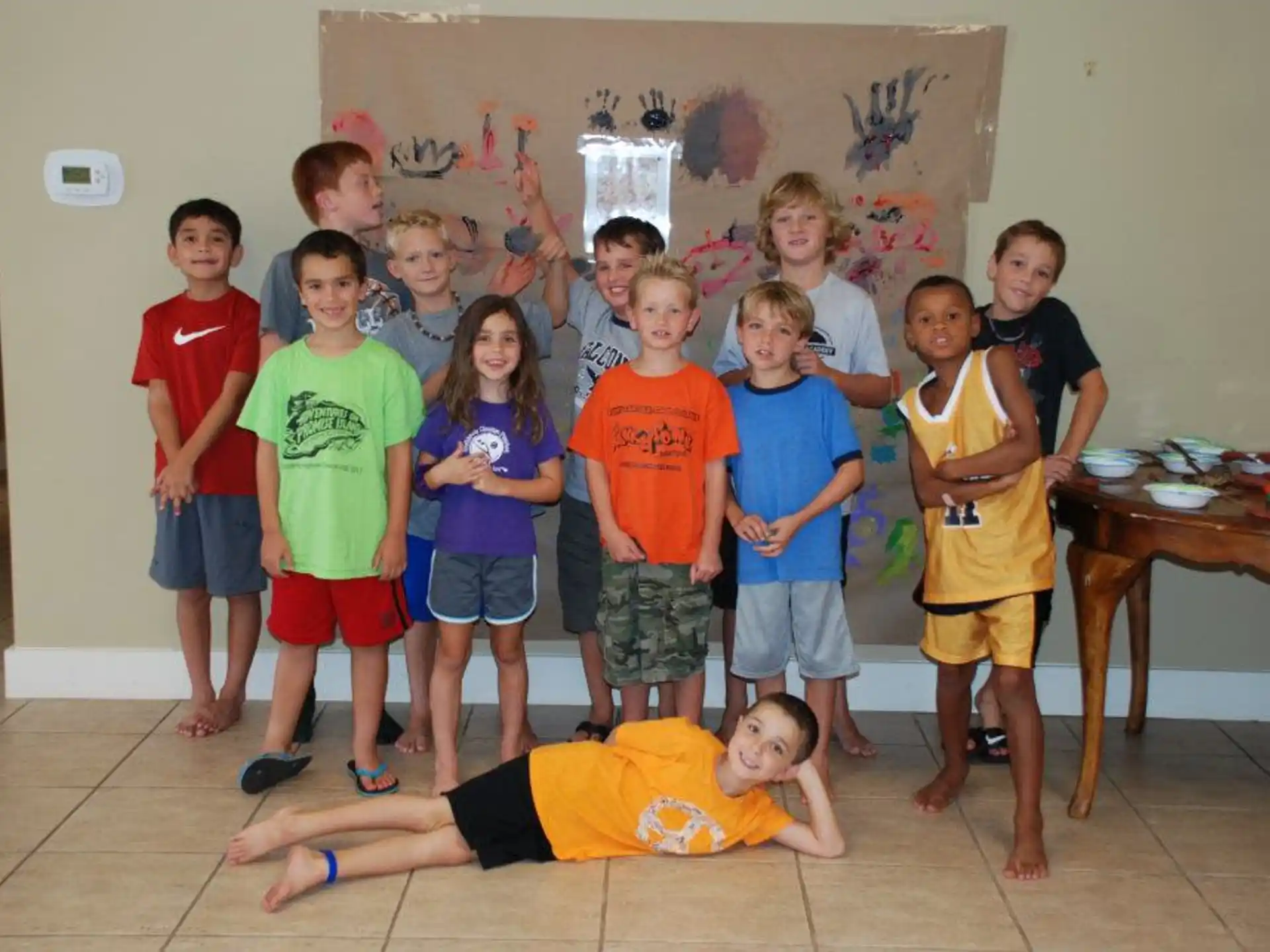 a group of children posing for a photo