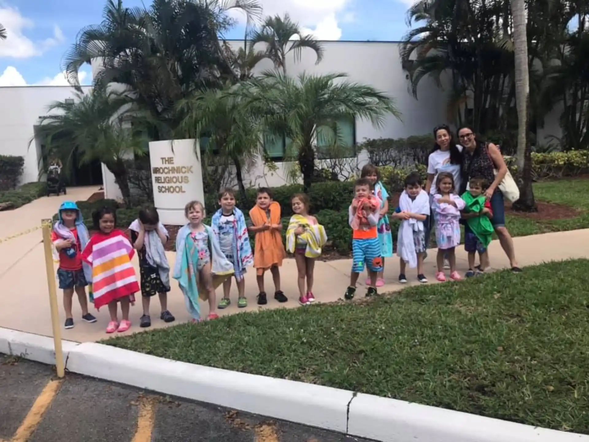 a group of children posing for a photo
