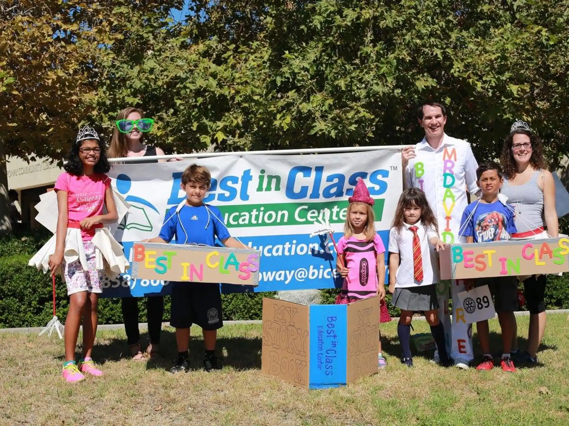 a group of people holding signs