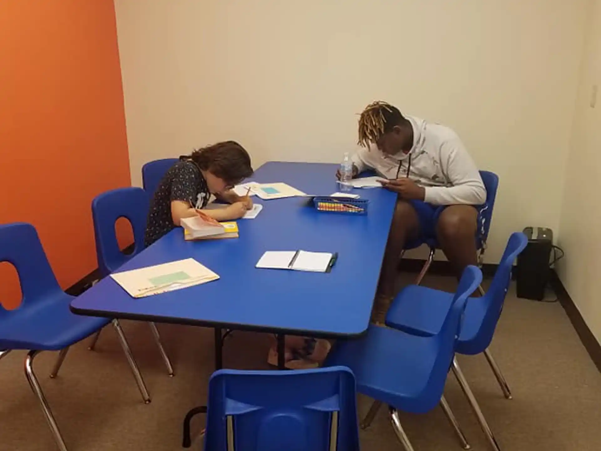 a few people sitting at a table