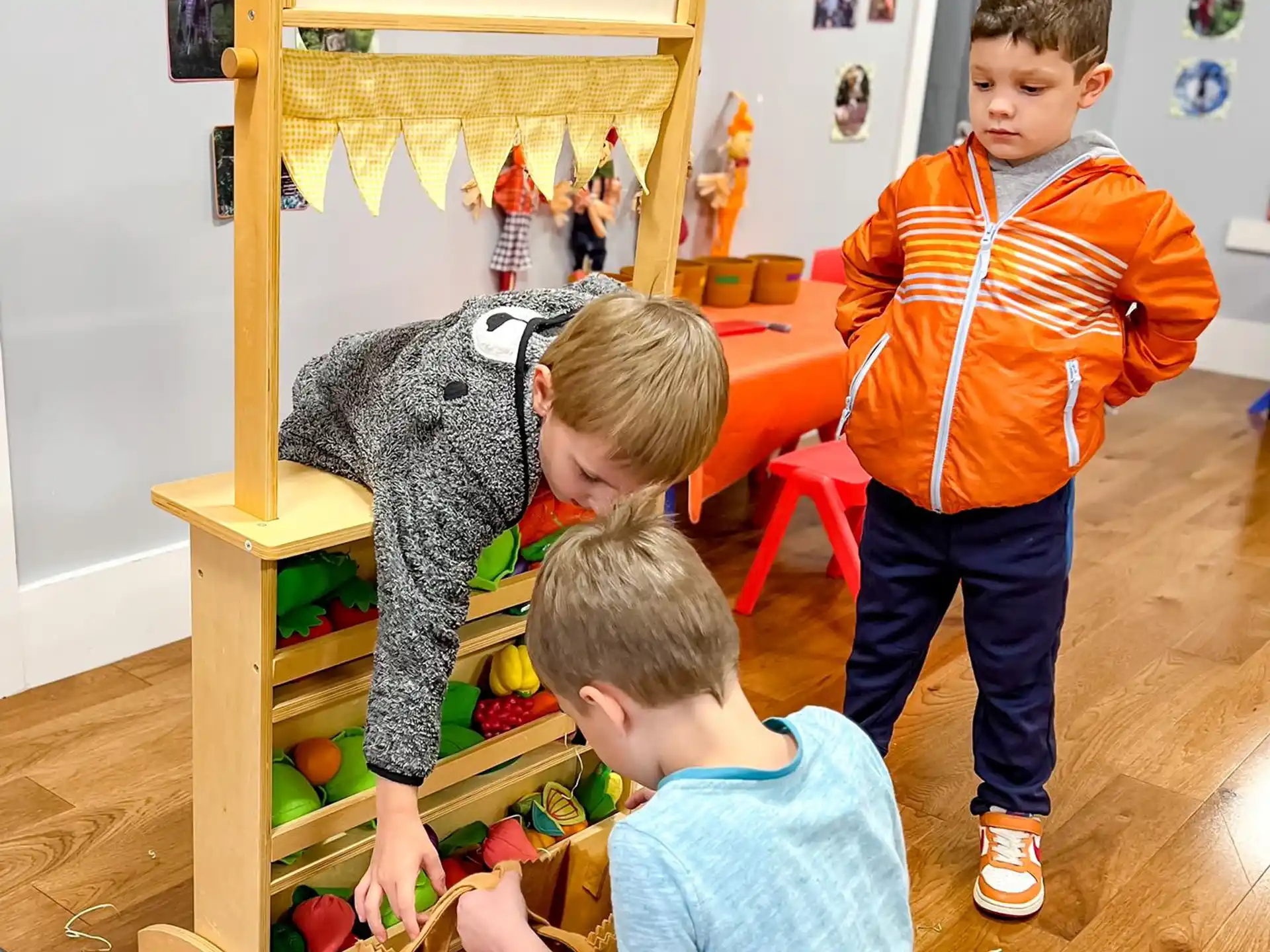 a group of boys playing with toys