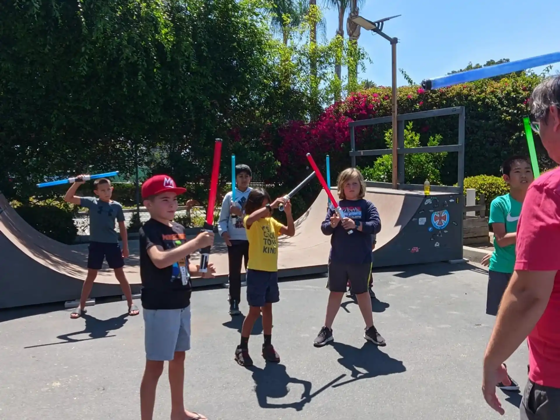 a group of people playing with a toy