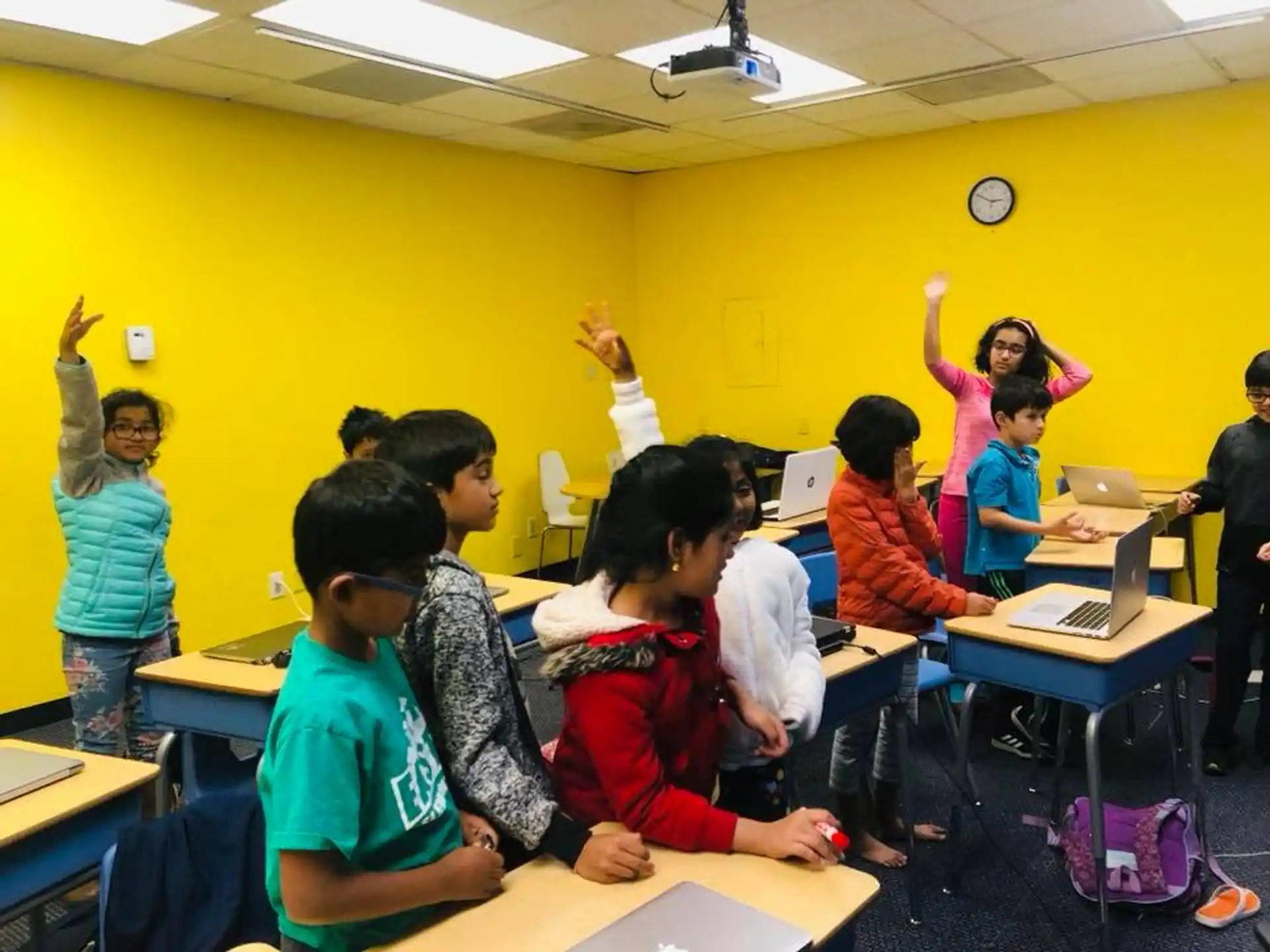 a group of children in a classroom