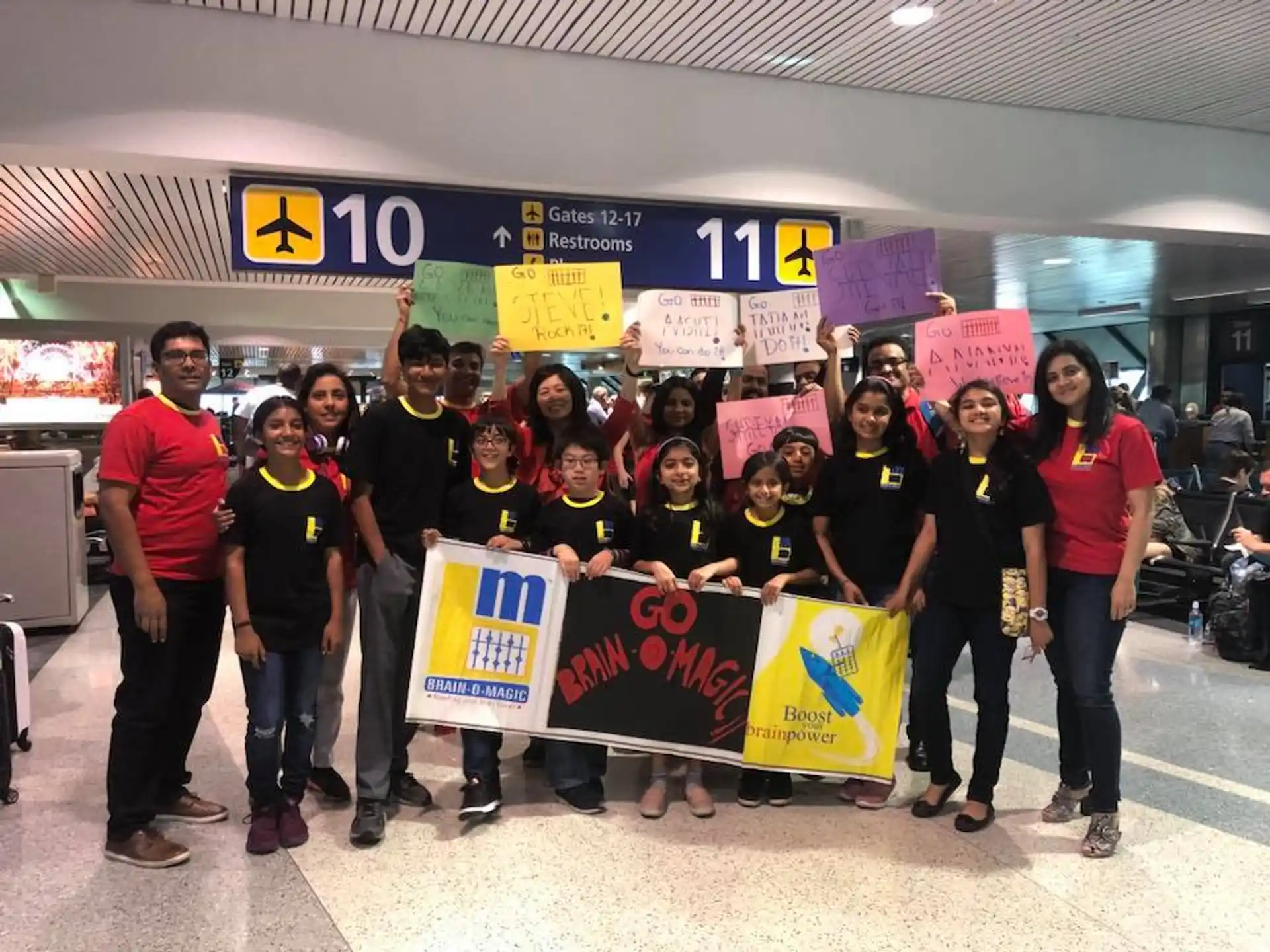 a group of people holding signs