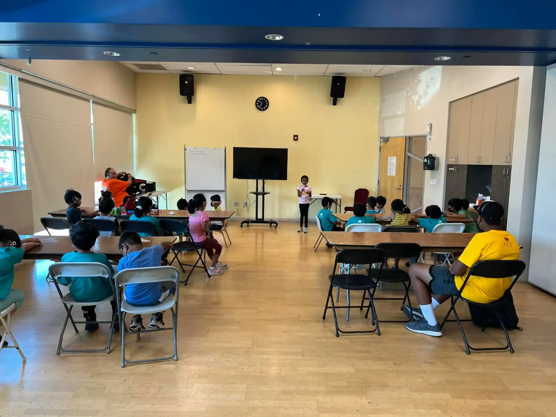 a group of people in a classroom