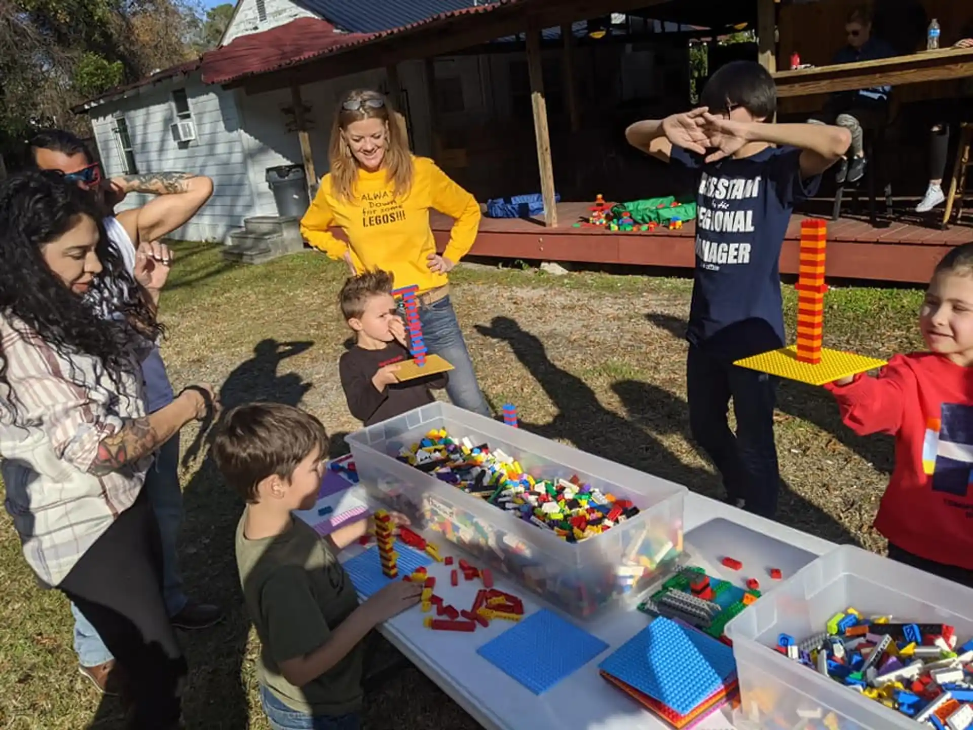 a group of people playing with toys