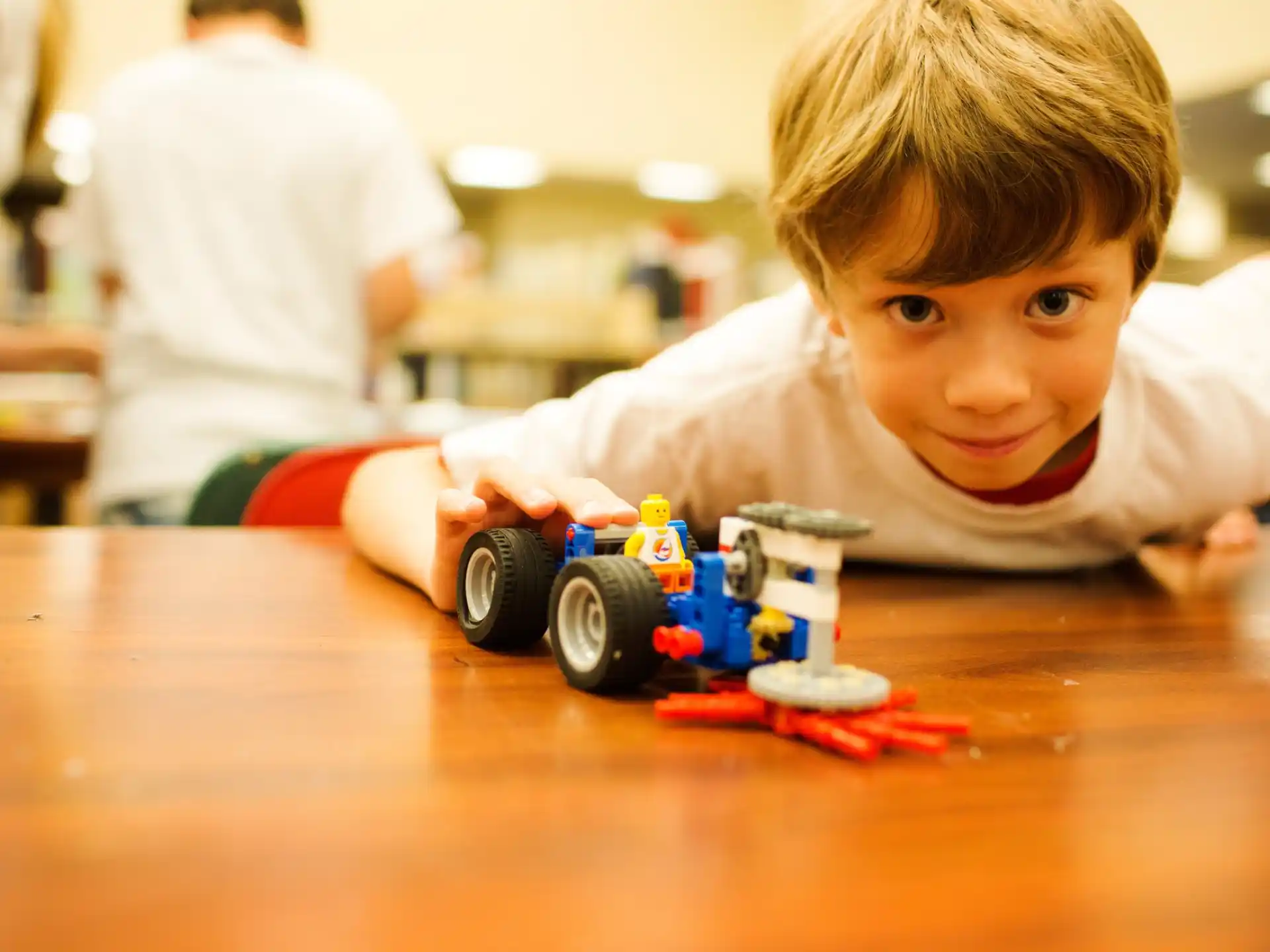 a boy playing with toys
