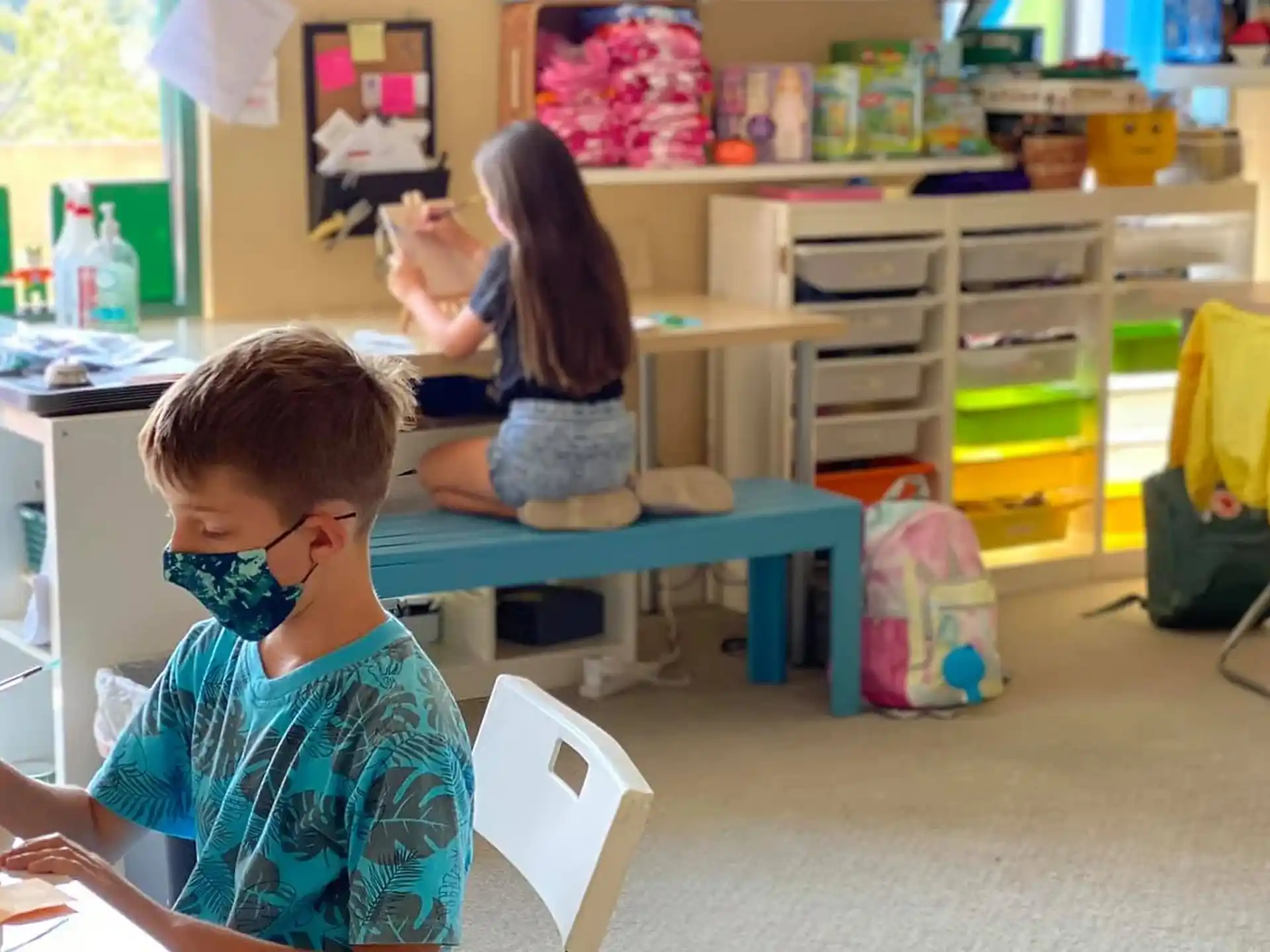 a group of children in a classroom