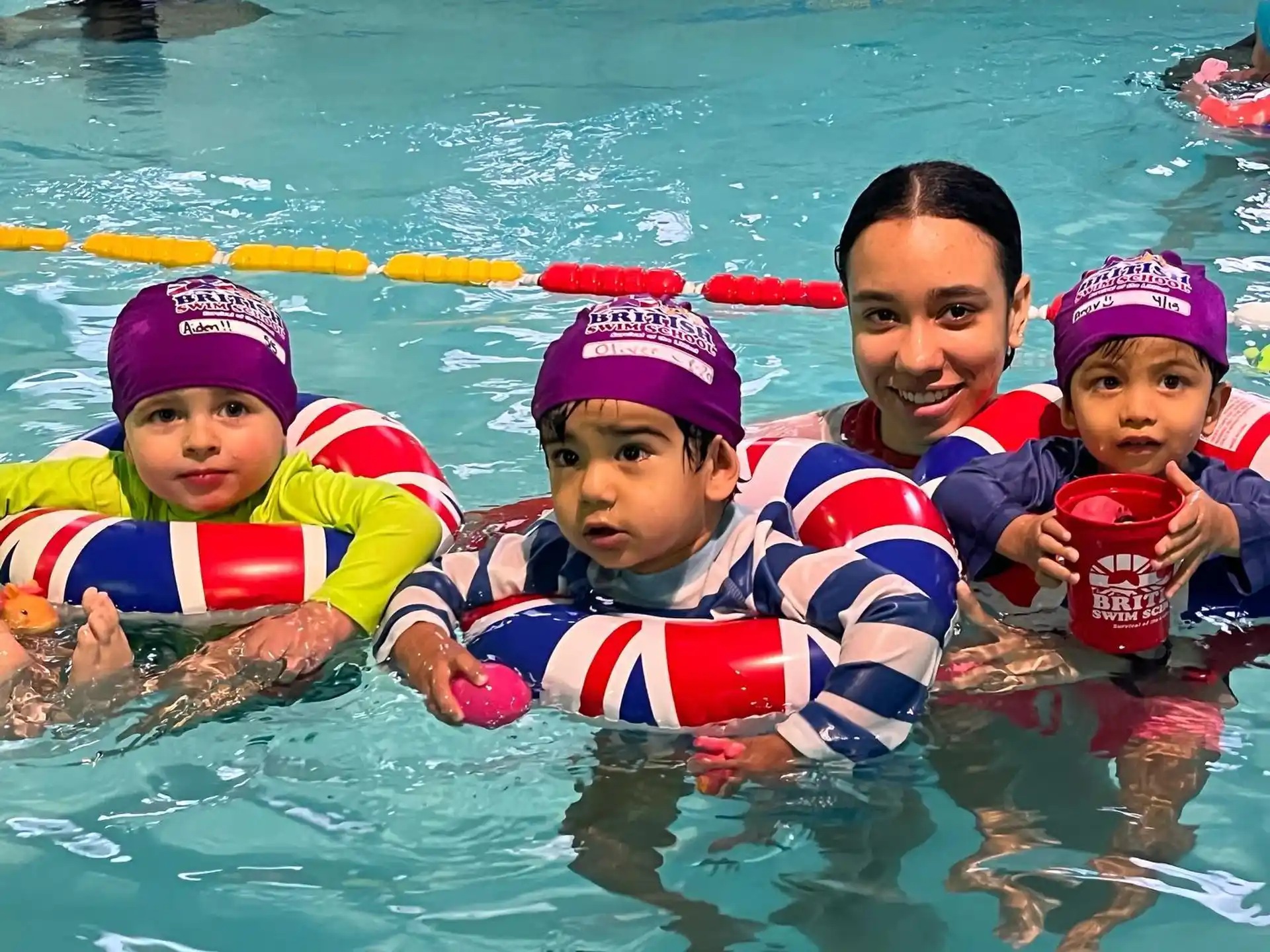 a group of kids in a pool