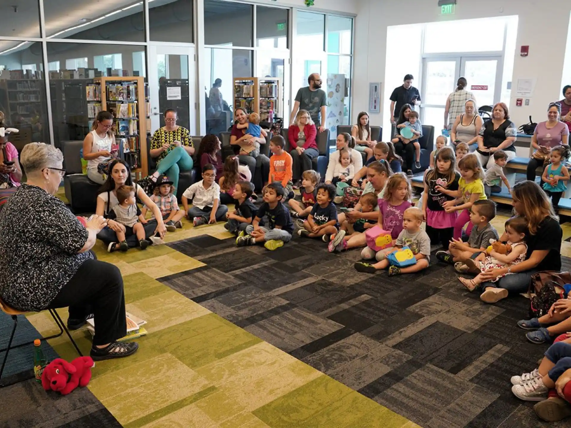 a group of people sitting on the floor