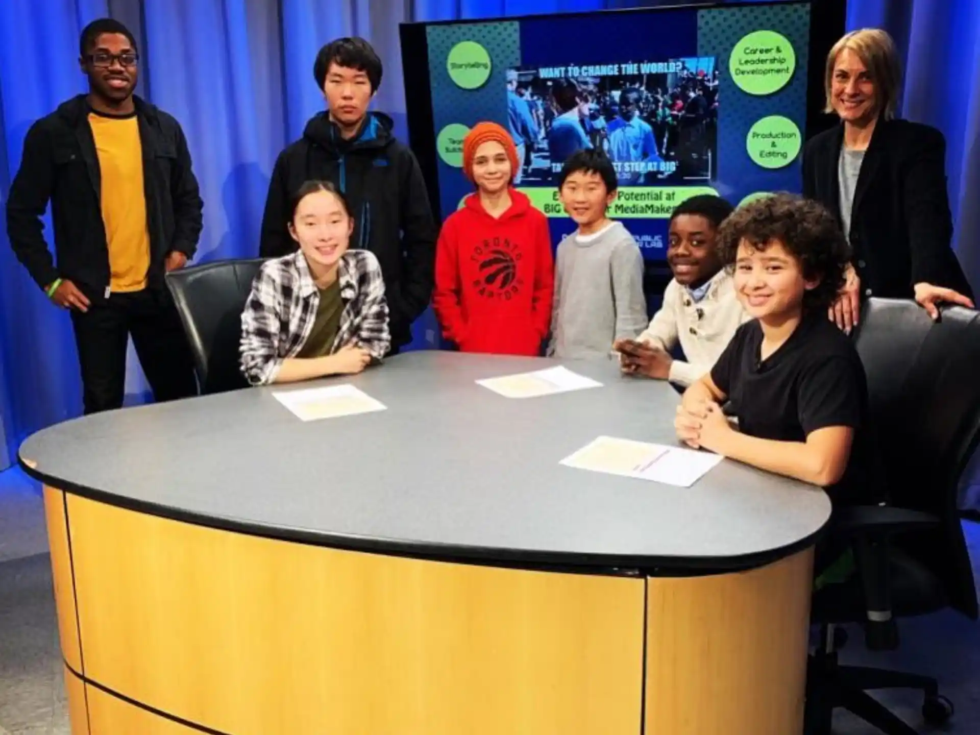 a group of people sitting at a table