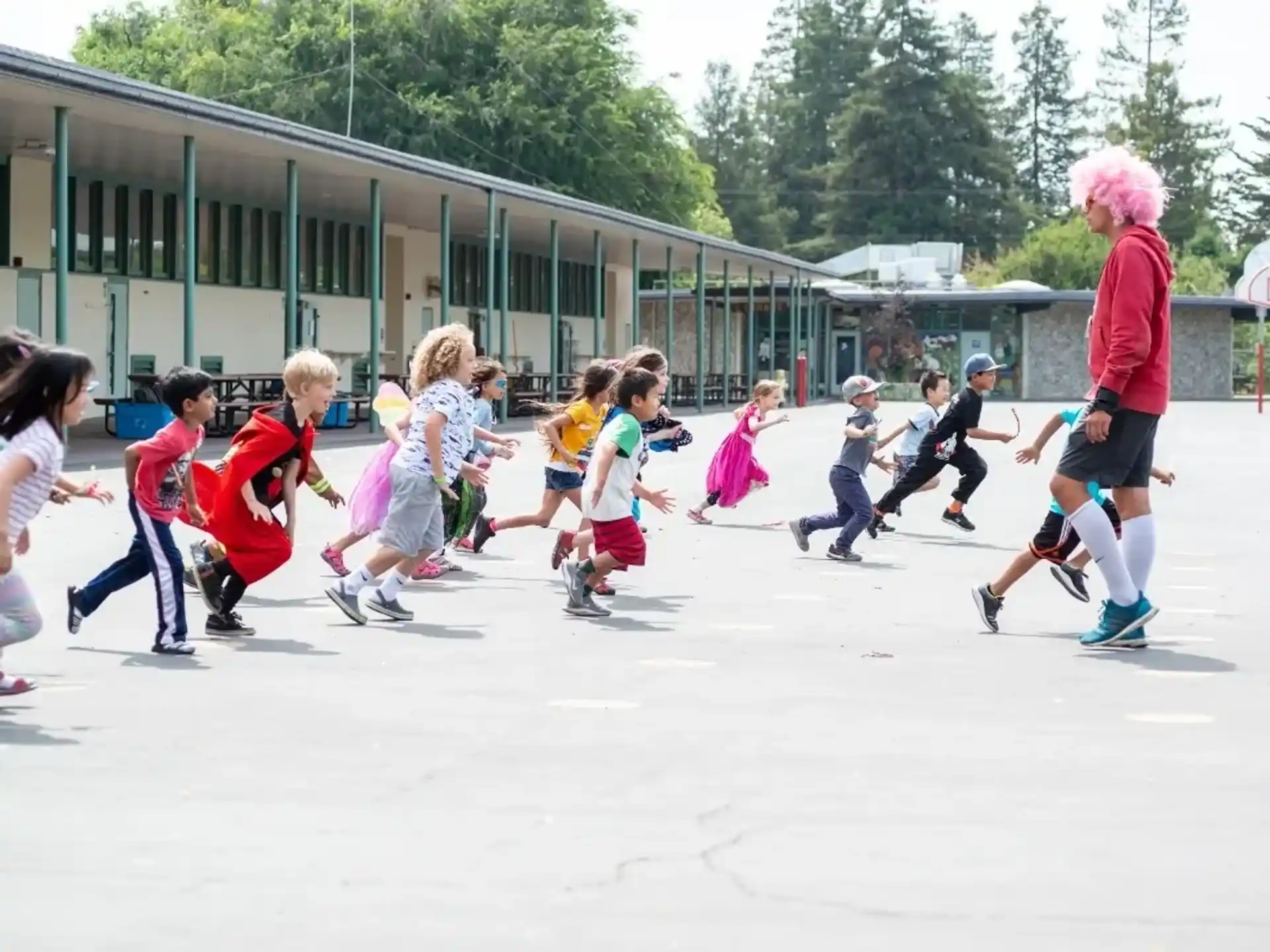 a group of kids playing ice hockey