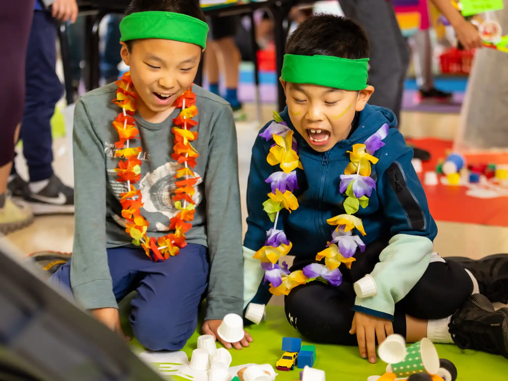 a couple of children playing with toys