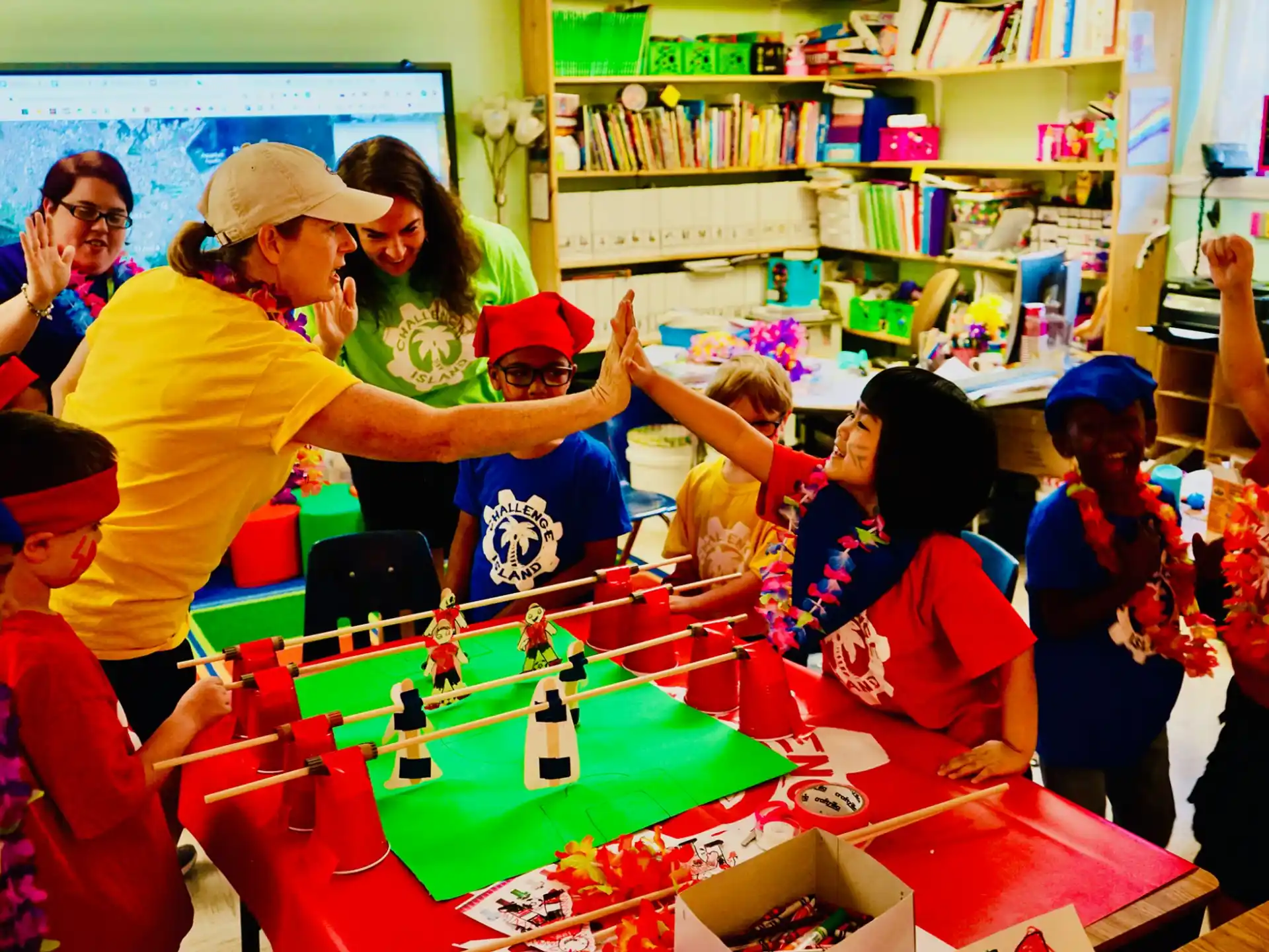 a group of people playing a board game