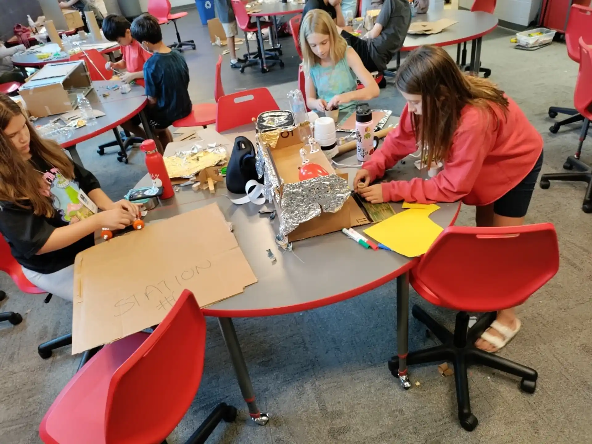 a group of people sitting at tables