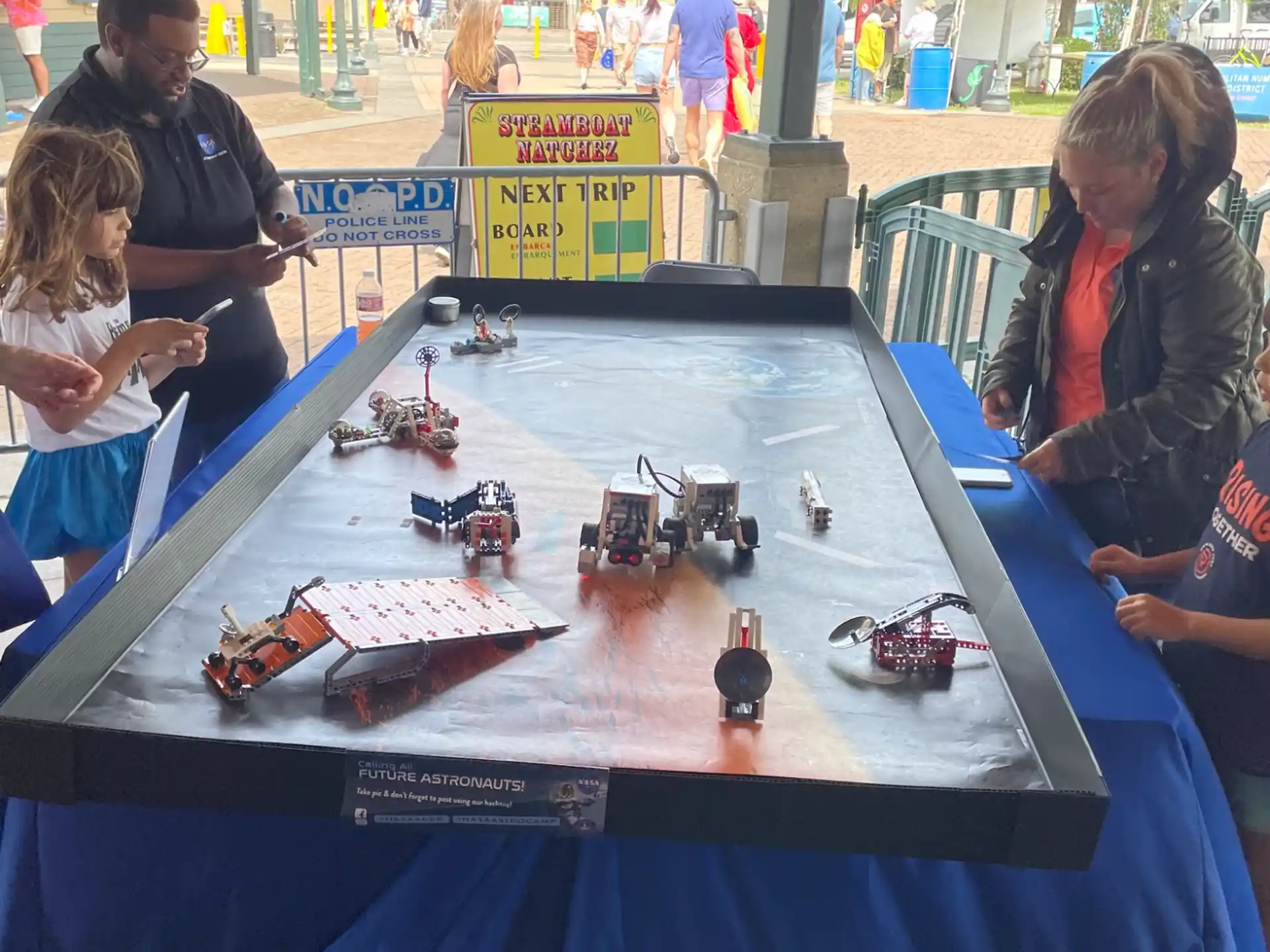 people playing chess at a table