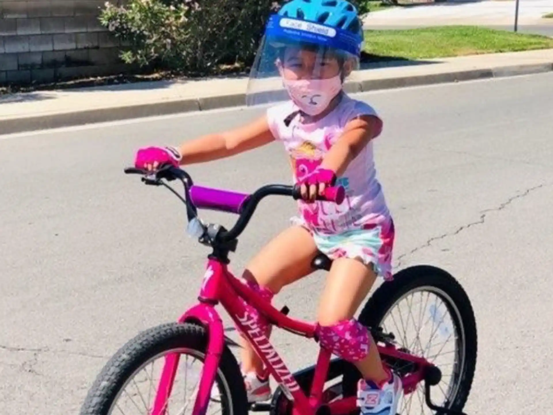 a girl riding a bike