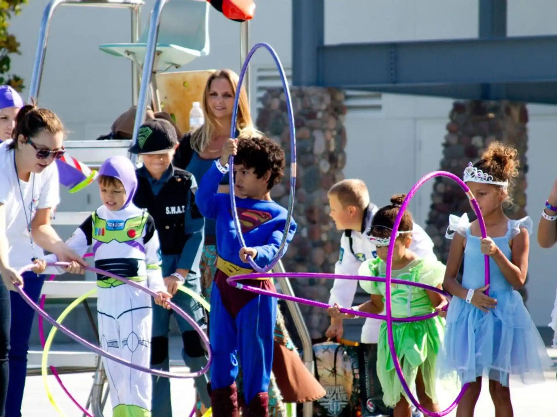 a group of people holding a ribbon