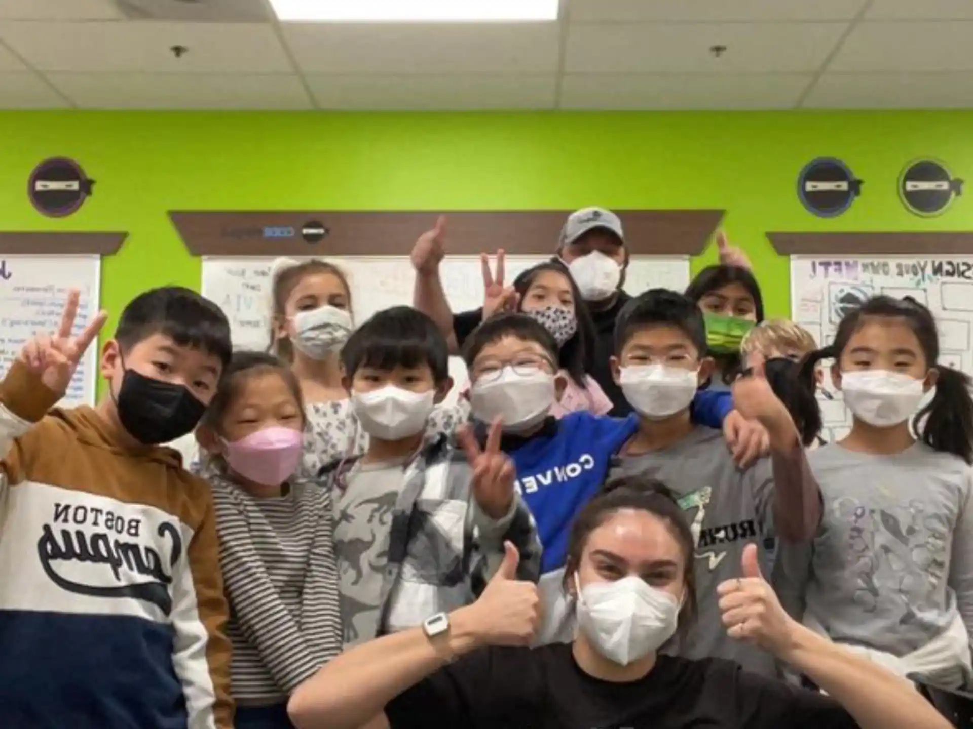 a group of people wearing masks