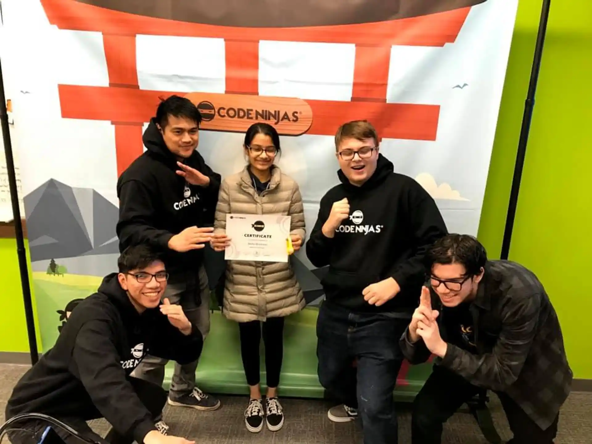 a group of people posing for a photo