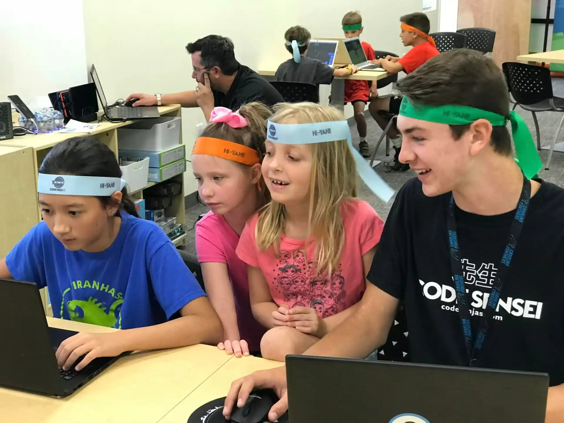 a group of children in a classroom