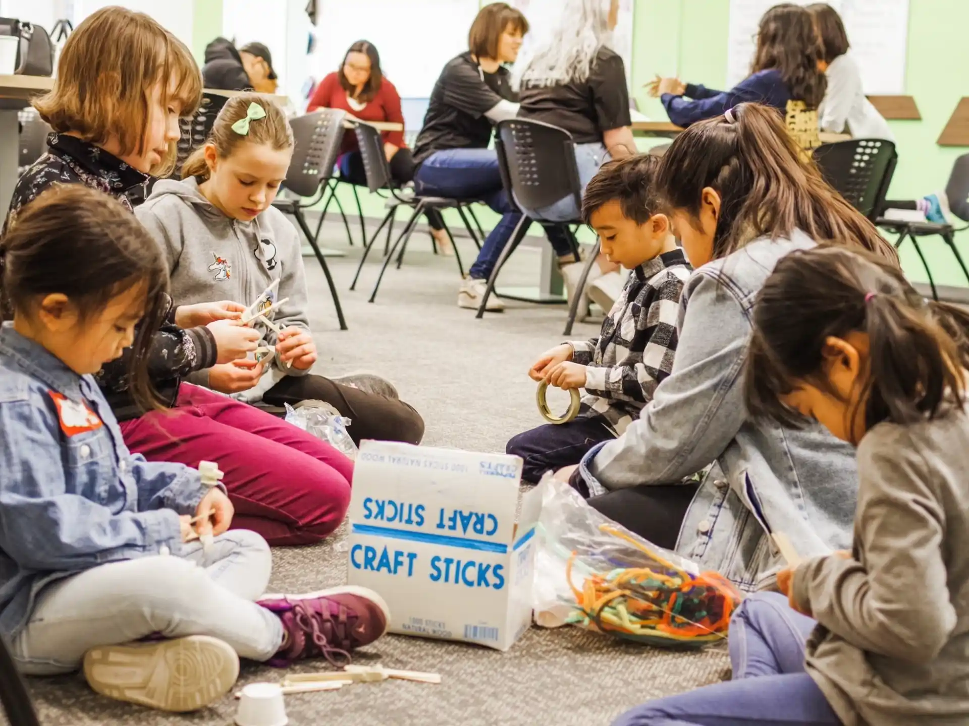 a group of children sitting in a circle