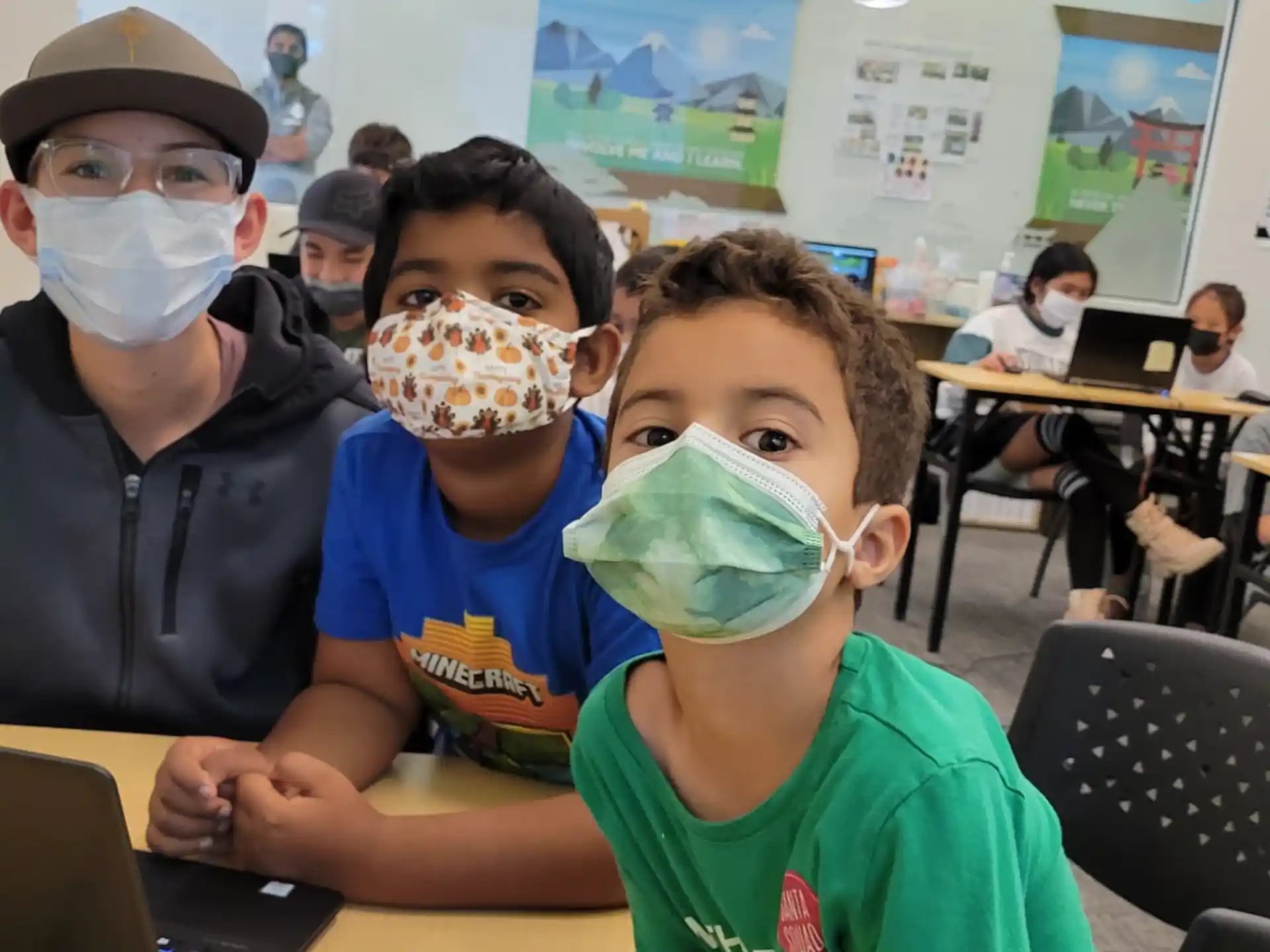 a group of children wearing masks