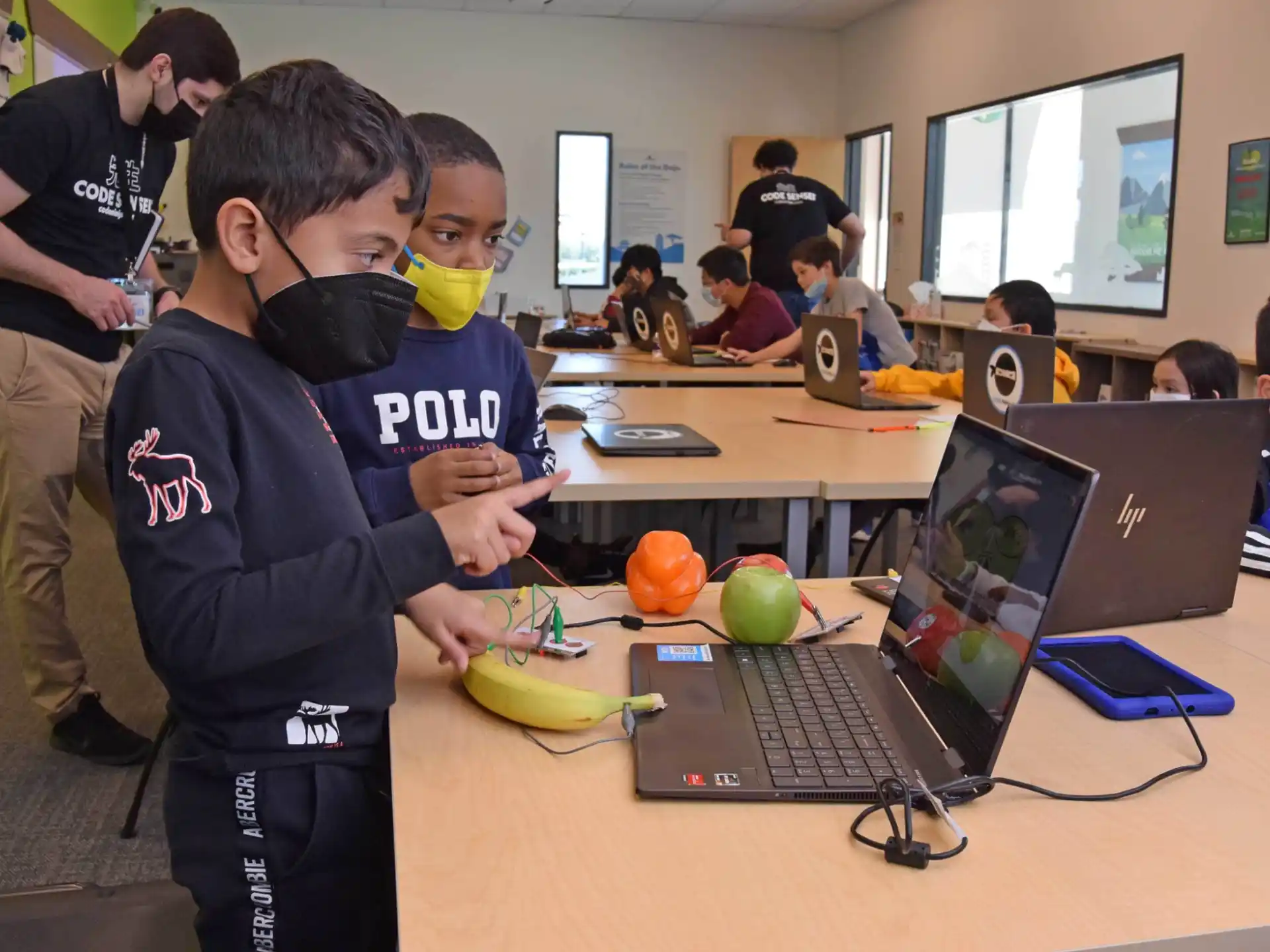 a group of kids in a classroom
