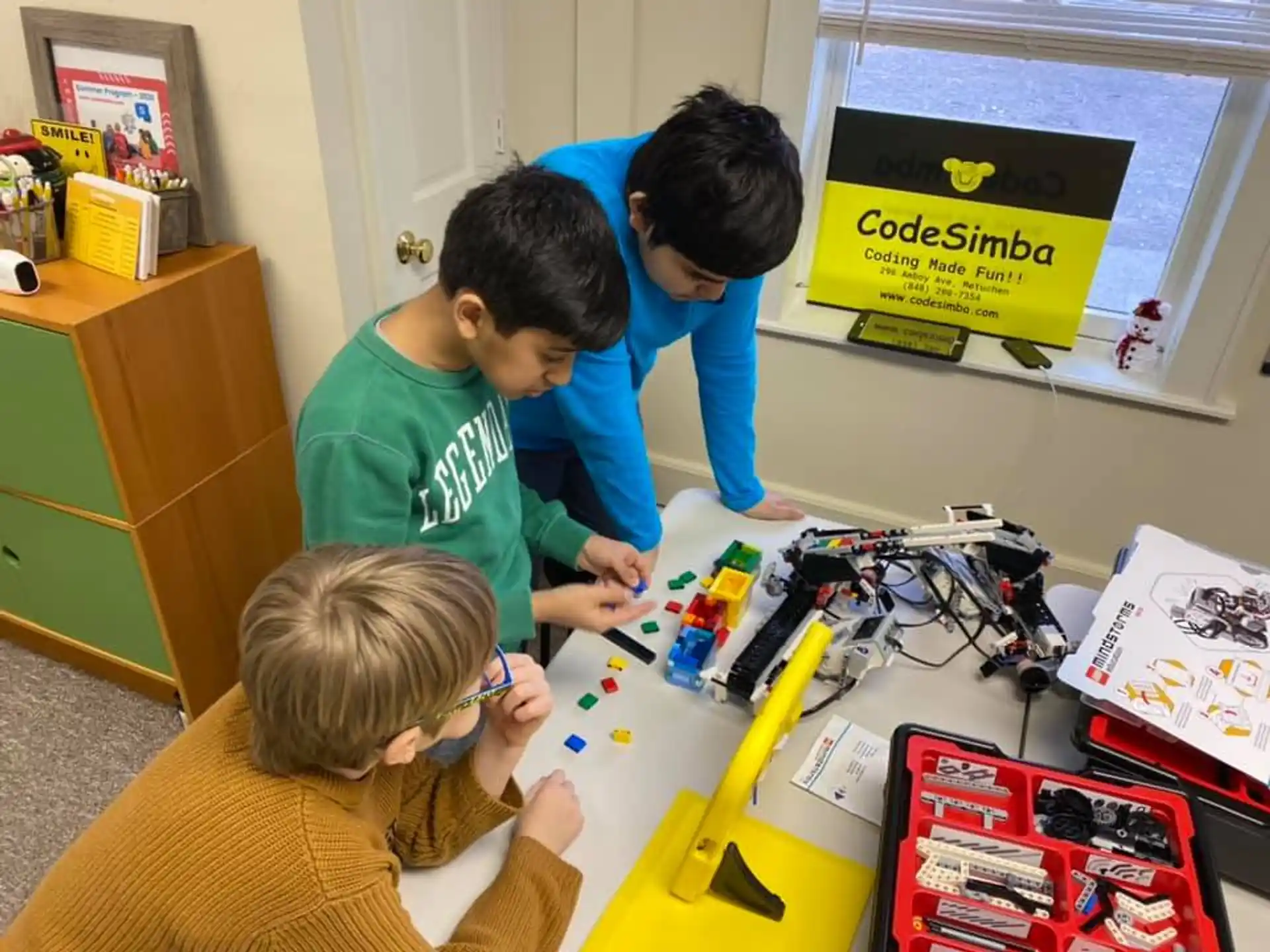 a group of kids playing with toys