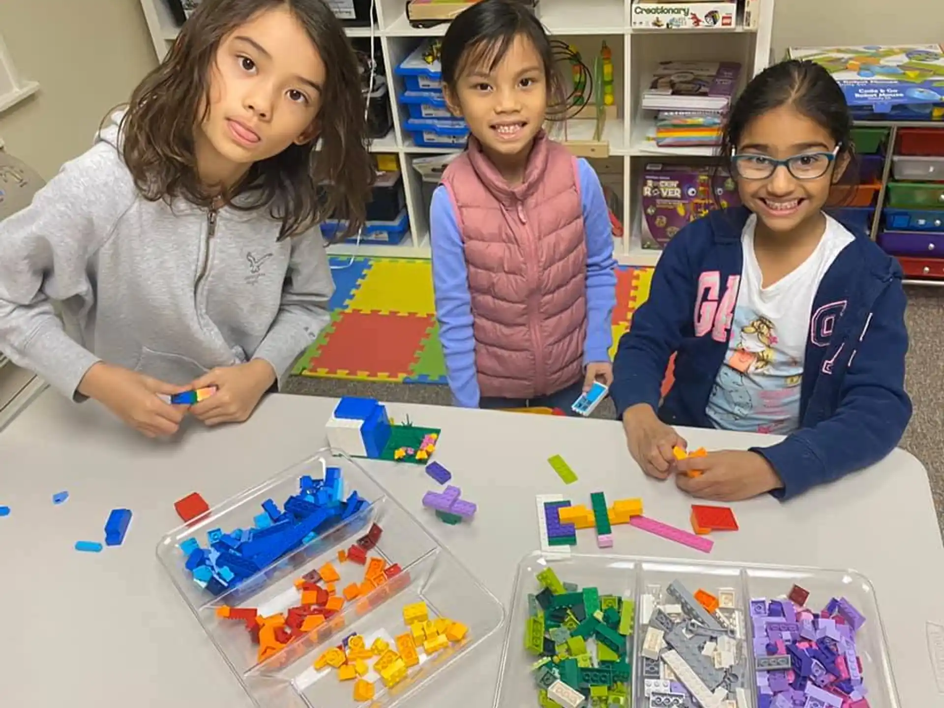 a group of kids playing with toys