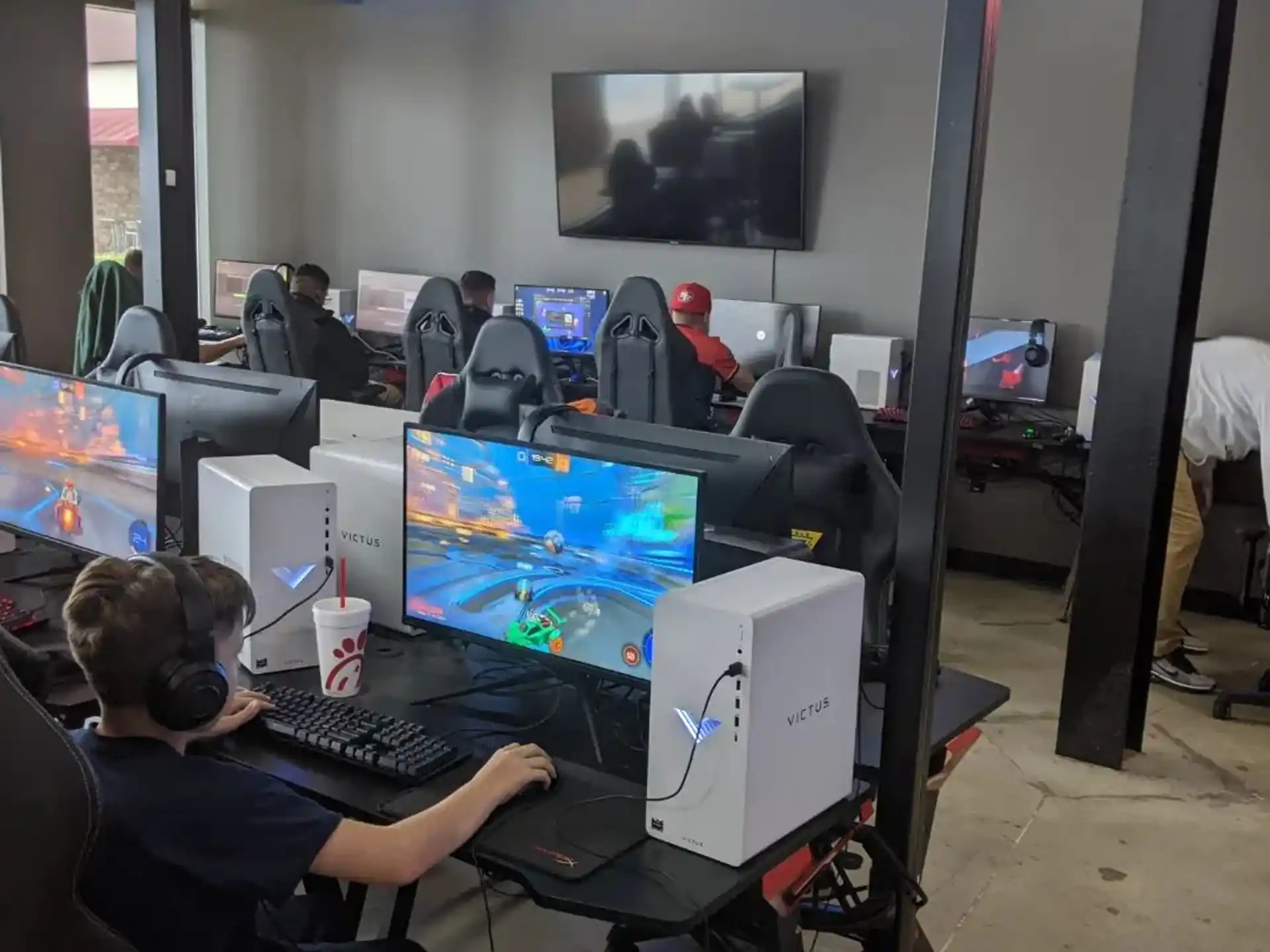 a group of people sitting at computers