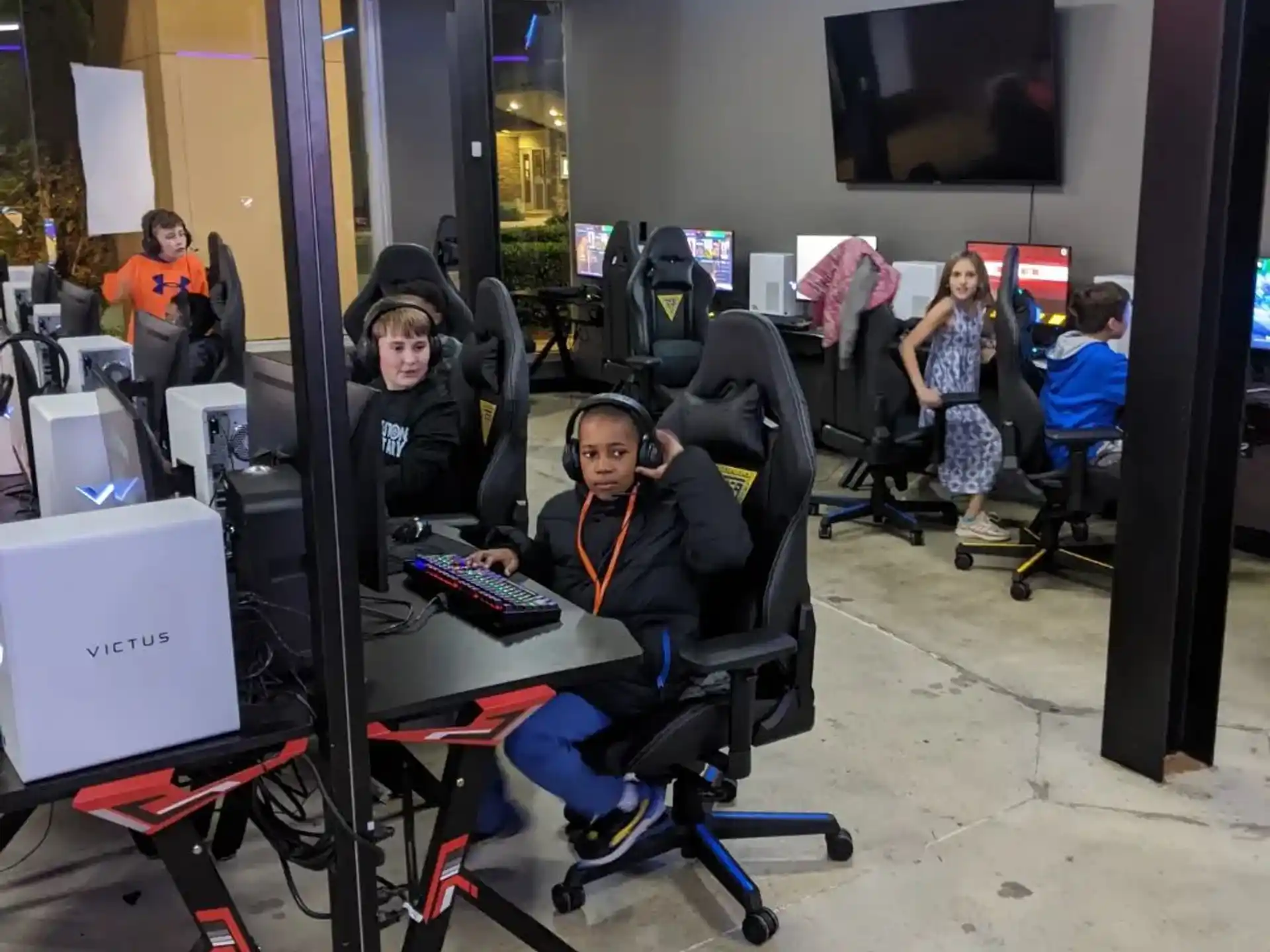 a group of people sitting at computers