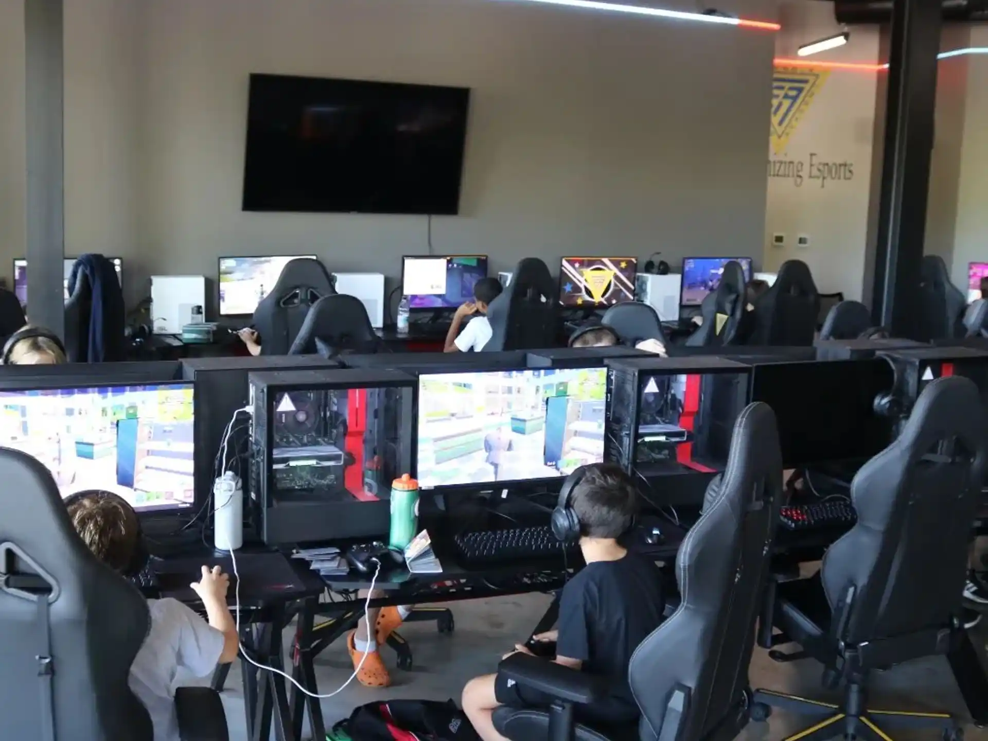 a group of people sitting at computers