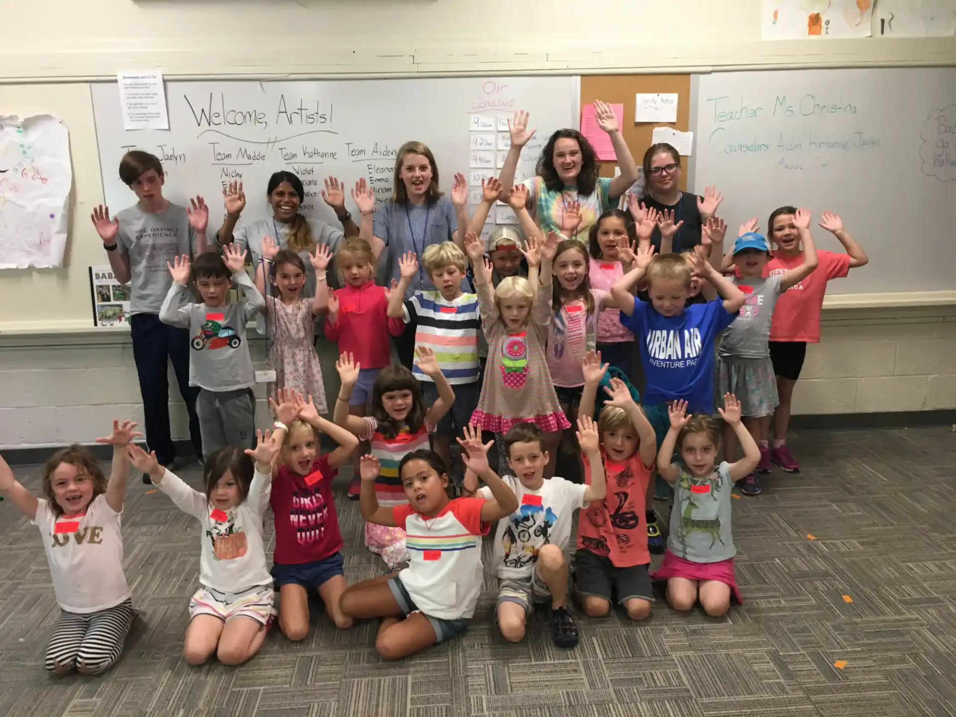 a group of children posing for a photo