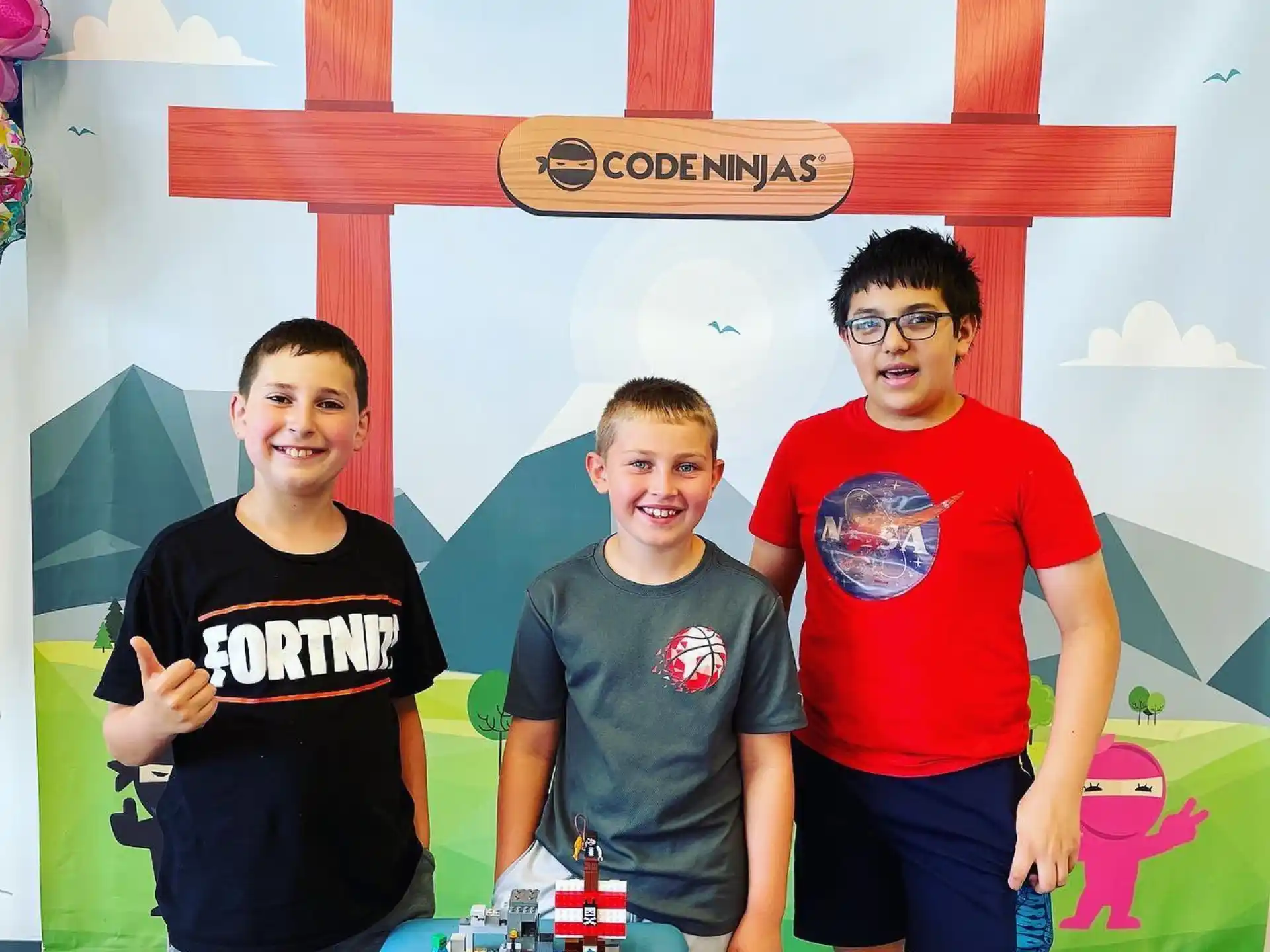 a group of boys posing for a picture
