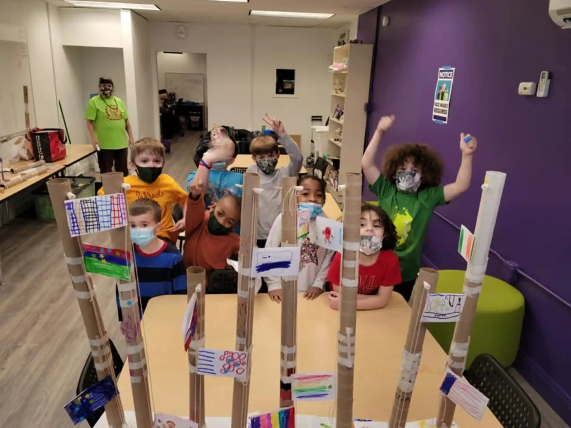 a group of children in a classroom