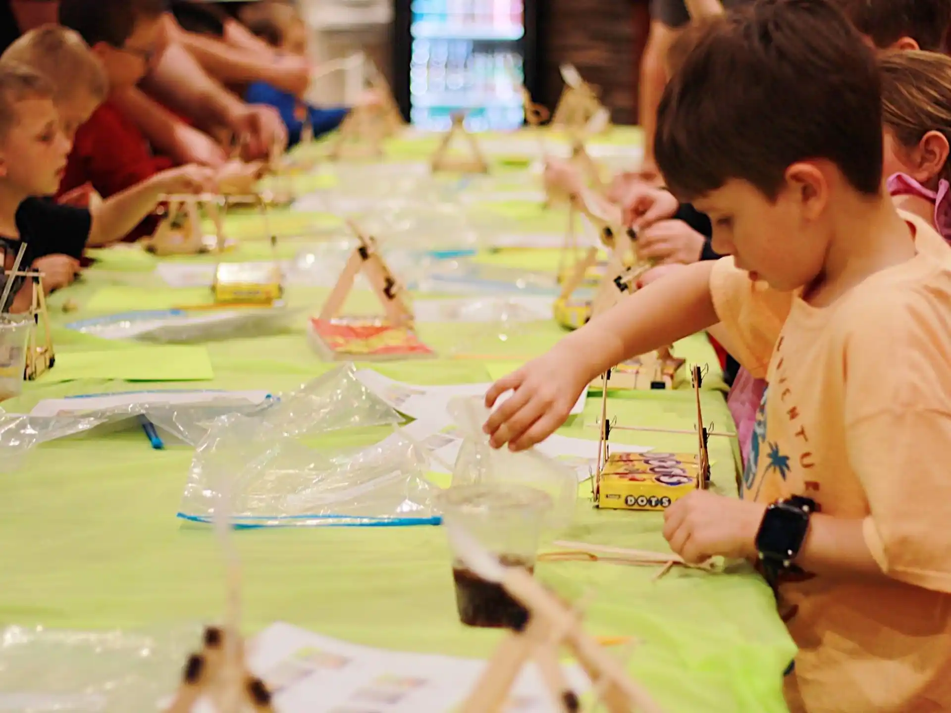 a group of children painting