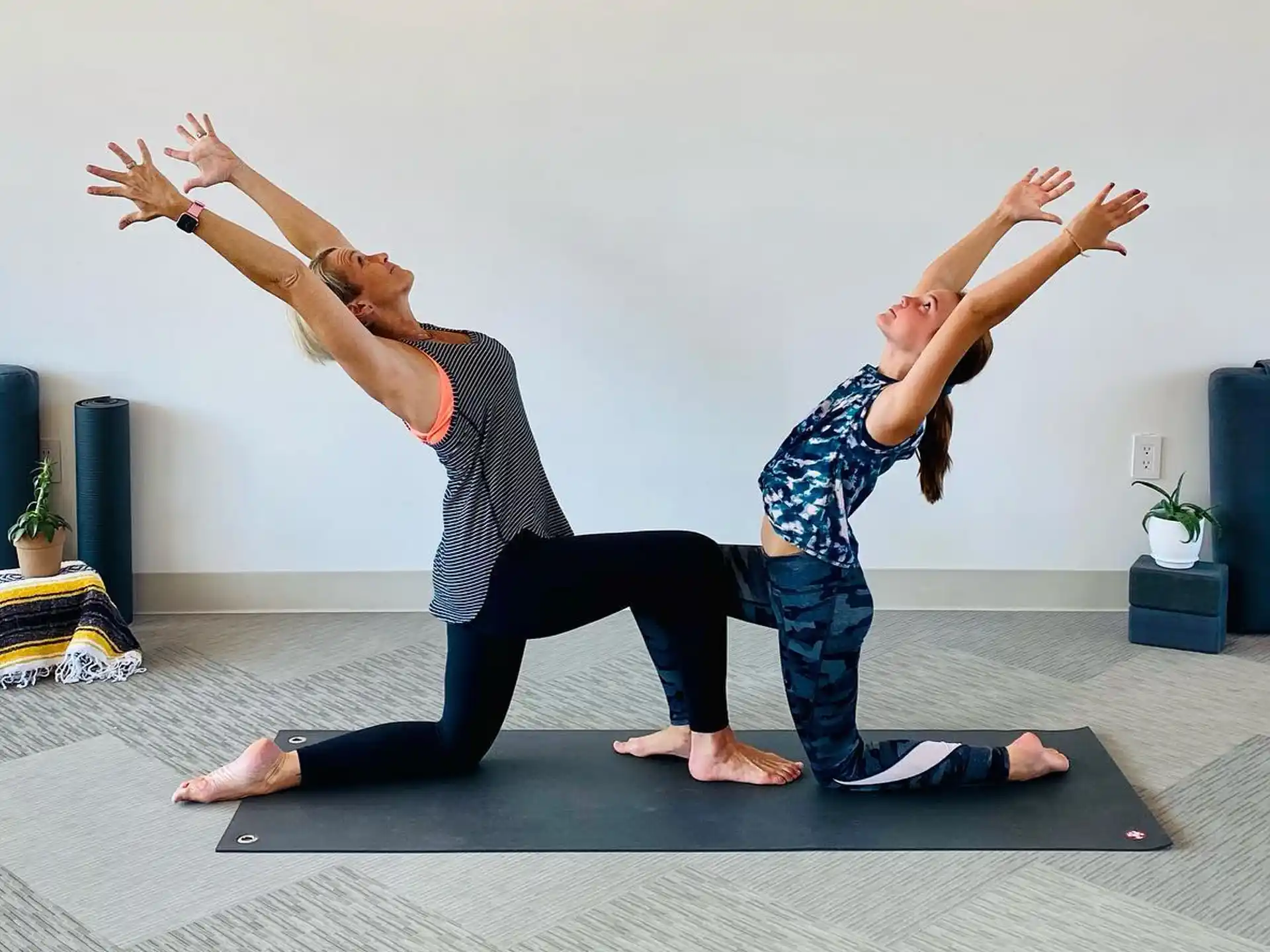 a group of people doing yoga