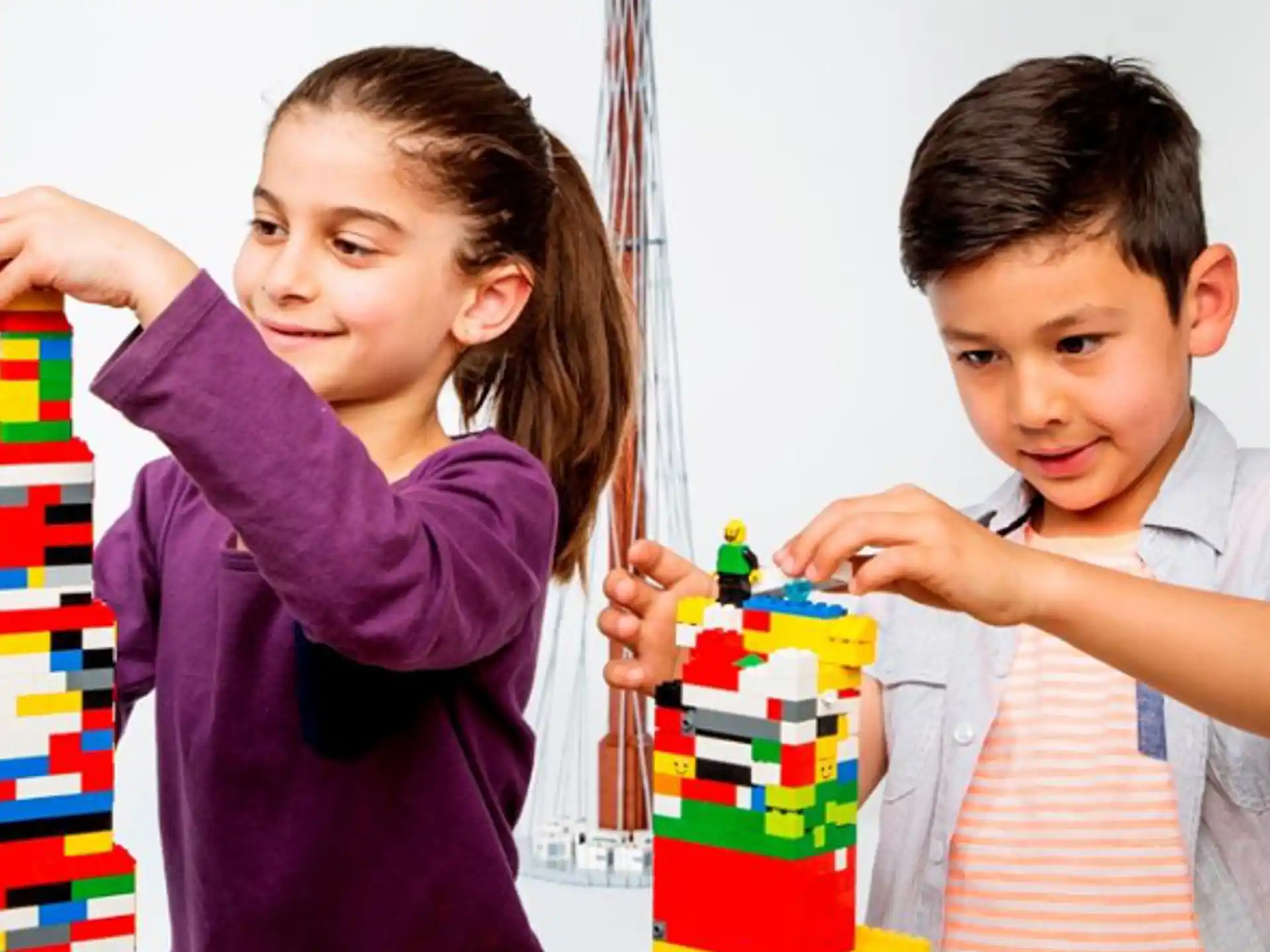 a person and a boy holding a gift box