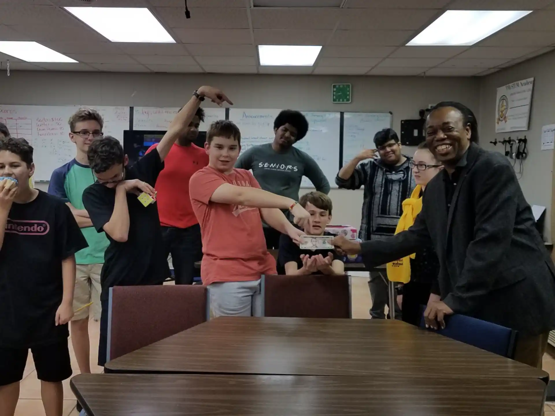 a group of people standing in a room